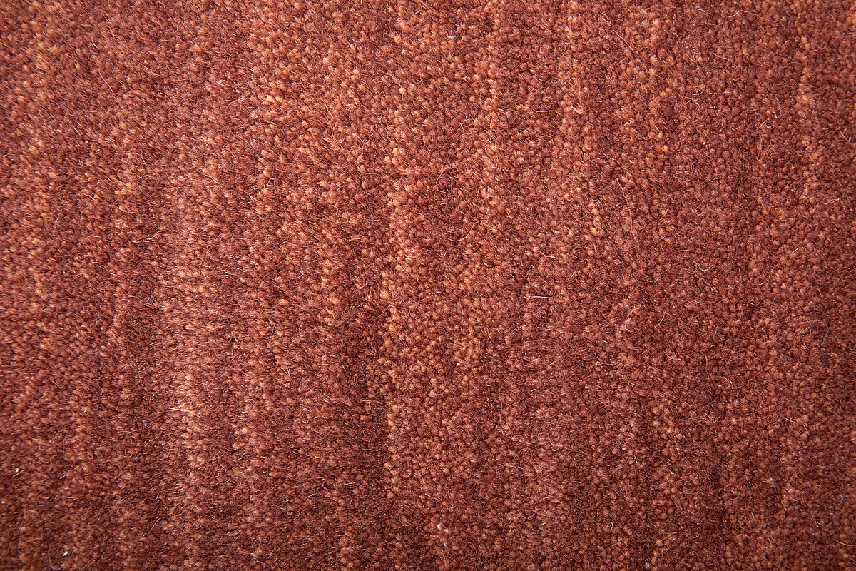 Takano Rust Red Wool Fabric Rug | Rooms to Go