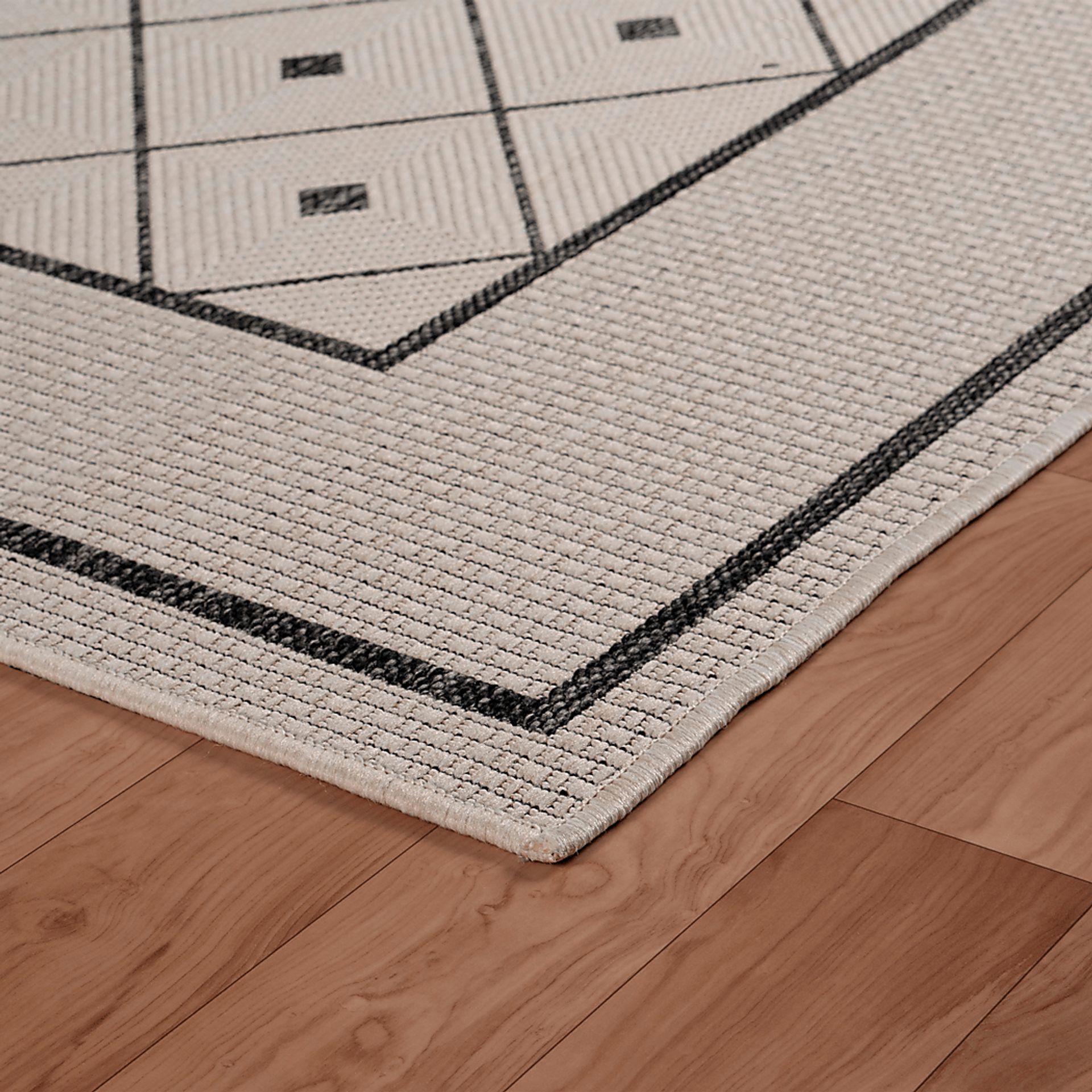 Tugeisa Black 7'6 x 9'5 Indoor/Outdoor Rug - Image 4