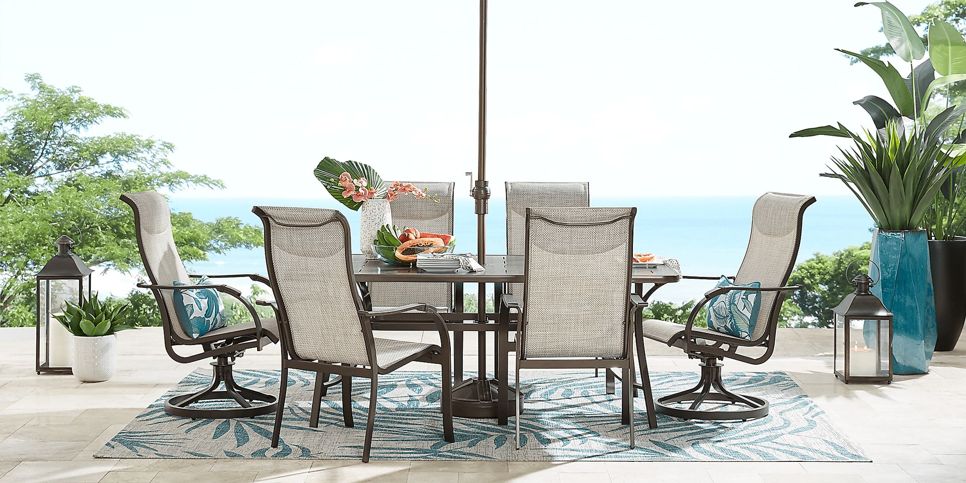 Windy Isle Bronze 7 Pc 72 in. Rectangle Outdoor Dining Set with Swivel Rockers - Image 2