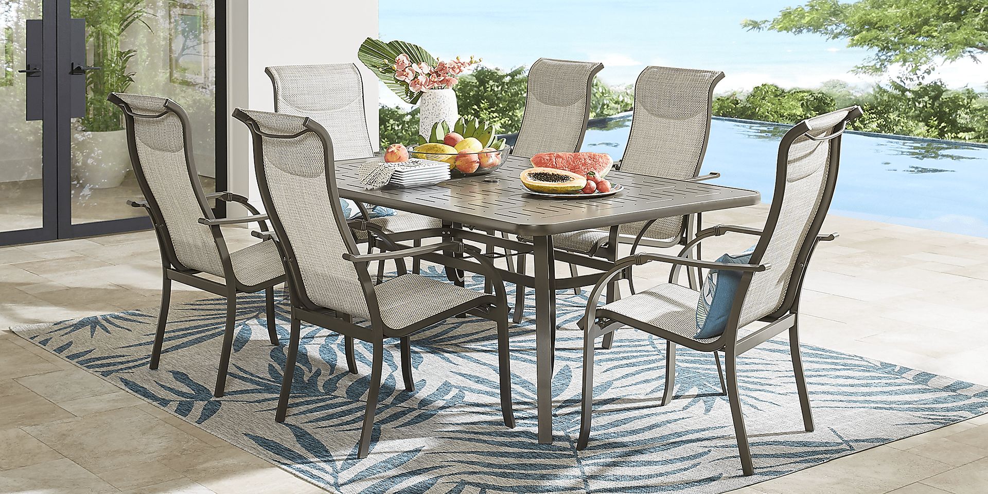 Windy Isle Bronze 7 Pc 72 in. Rectangle Outdoor Dining Set - Image 1
