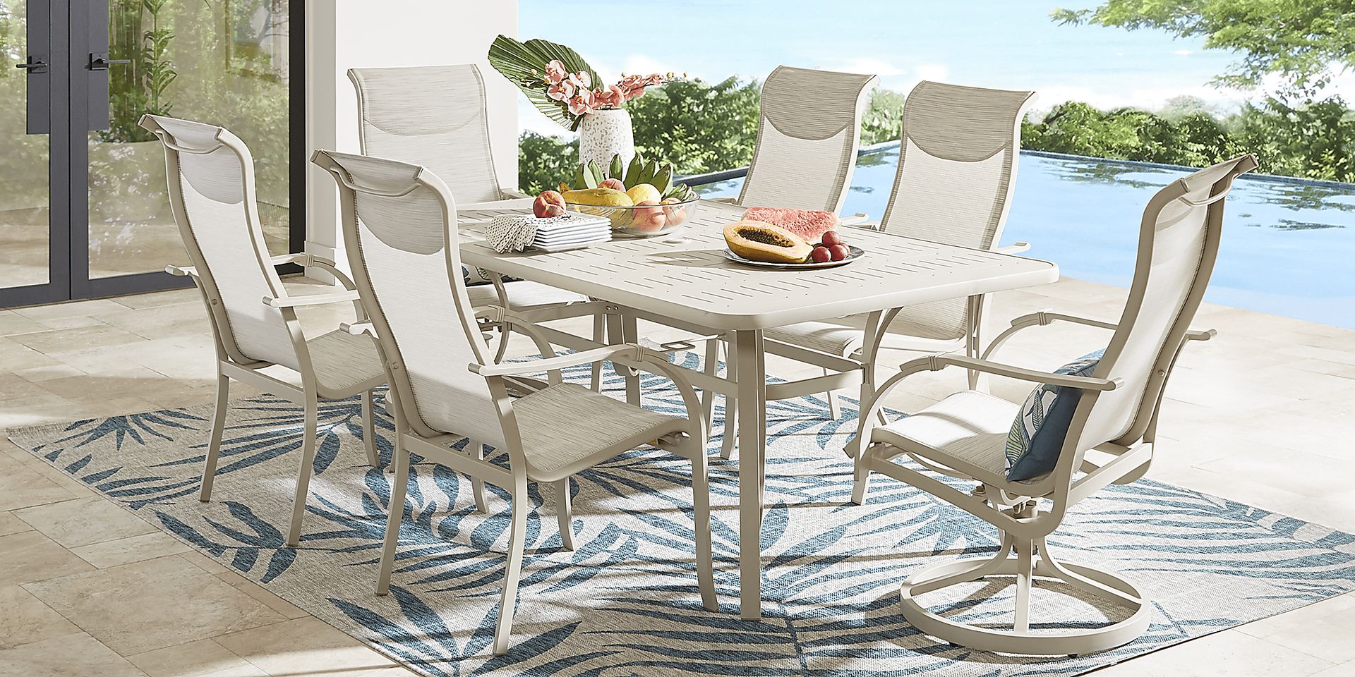 Windy Isle Sand 7 Pc 72 in. Rectangle Outdoor Dining Set with Swivel Rockers - Image 1