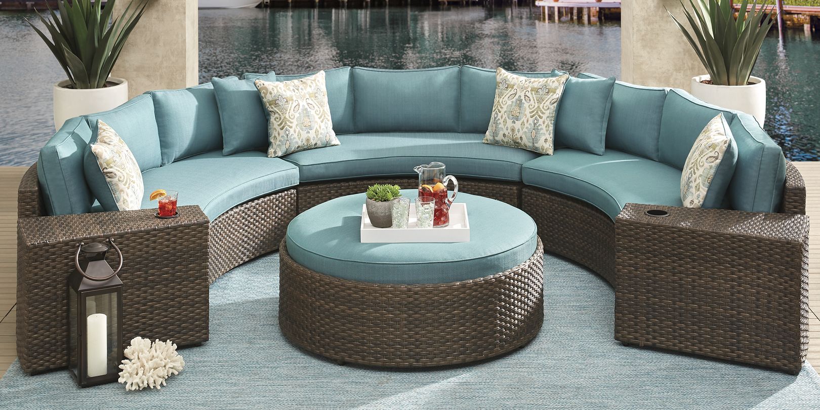 Photo of curved outdoor sectional with seafoam cushions