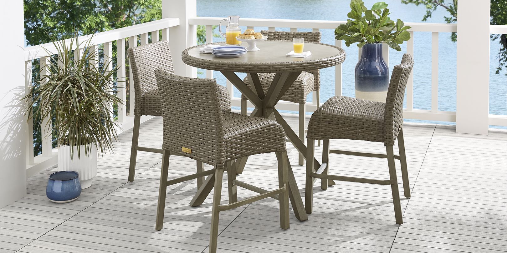 Photo of brown round wicker dining set