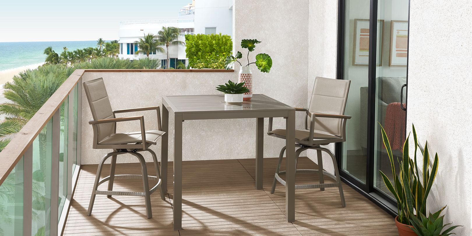 Photo of a balcony with white and terracotta planters