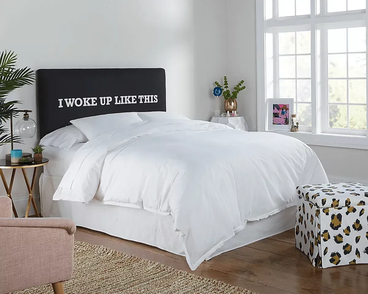 Stylish teen bedroom with printed storage ottoman