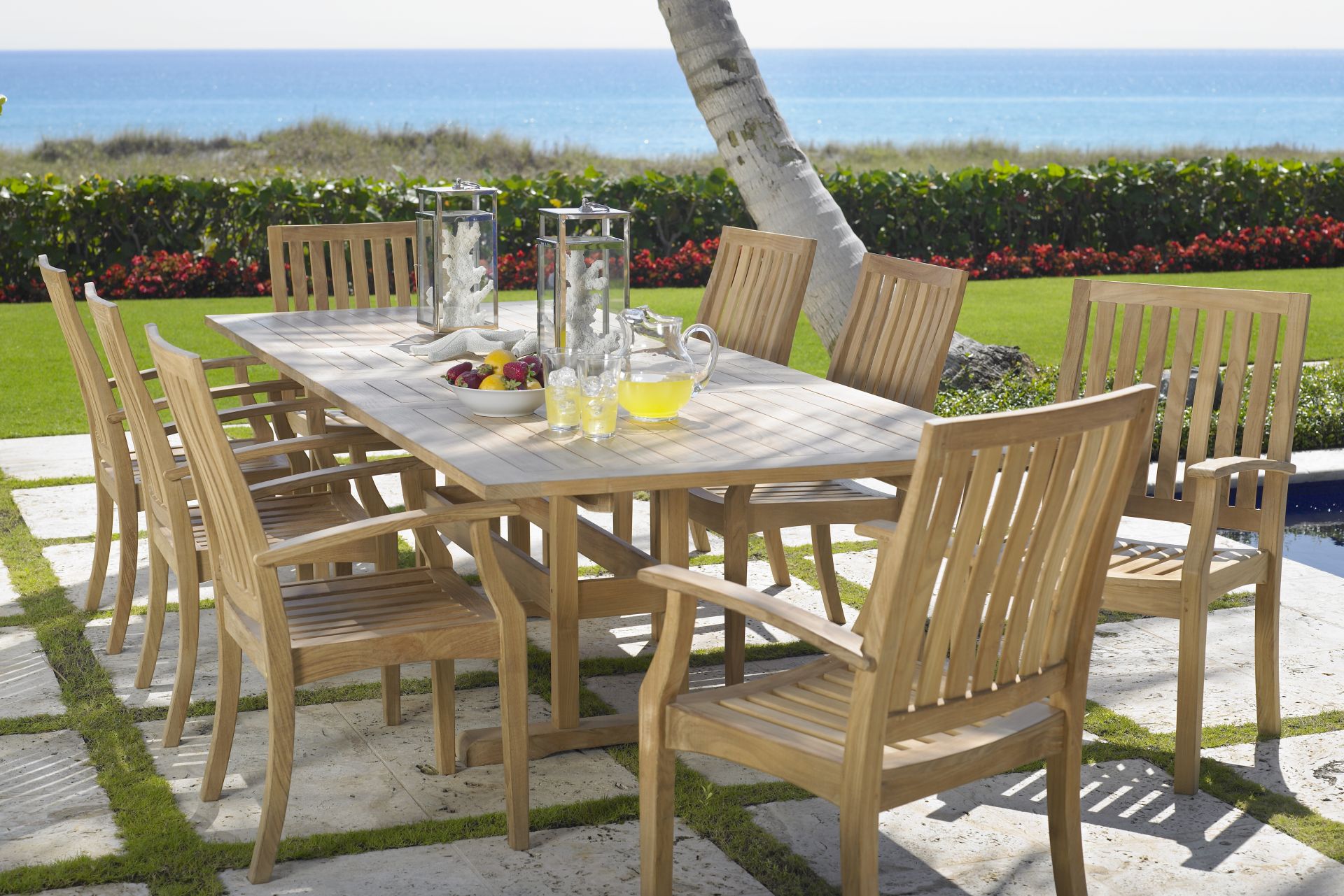 Pleasant Bay Teak 9 Pc Rectangle Extension Outdoor Dining Set - Image 1
