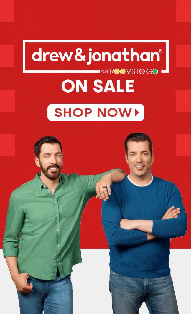 drew & jonathan for Rooms To Go. On Sale. Shop Now. Two men in front of a red background.
