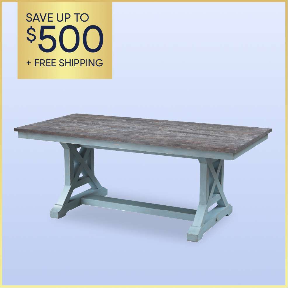 SAVE UP TO $500 + FREE SHIPPING. A wooden dining table with a gray top and blue legs.
