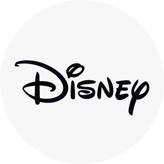 Disney logo in a white circle.
