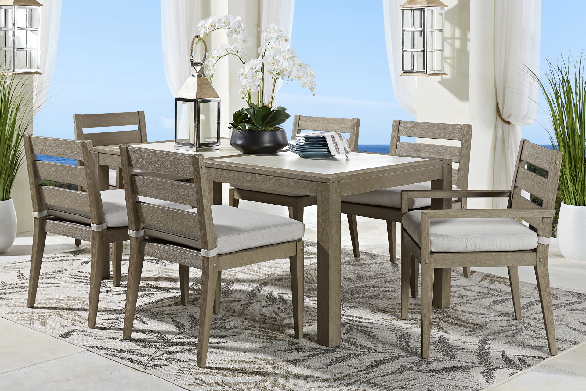 Lake Tahoe Gray 7 Pc Rectangle Outdoor Dining Set with Seagull Cushions - Image 1