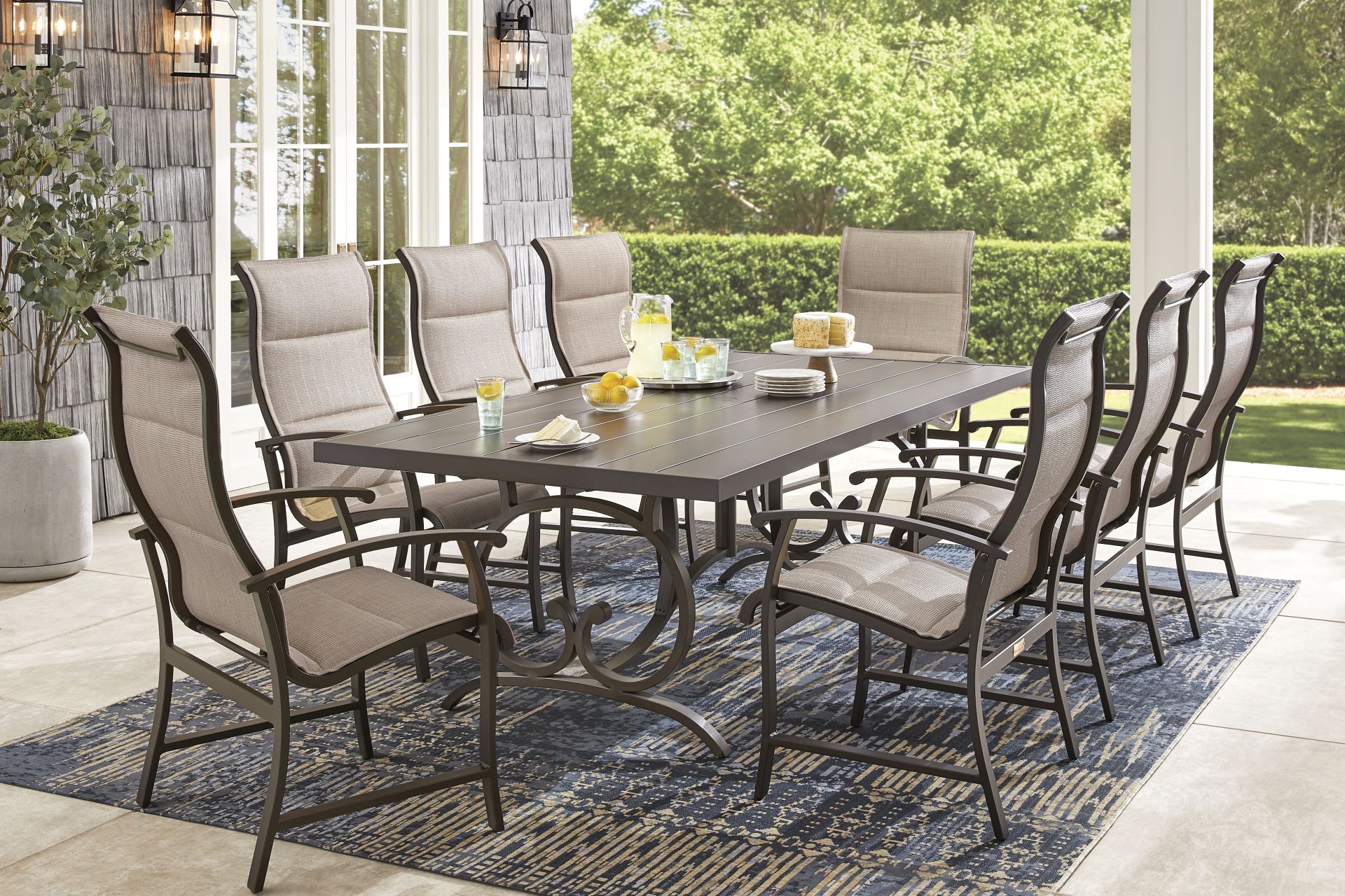 Lake Breeze Aged Bronze 9 Pc Outdoor 90 in. Rectangle Dining Set with Sling Chairs - Image 1