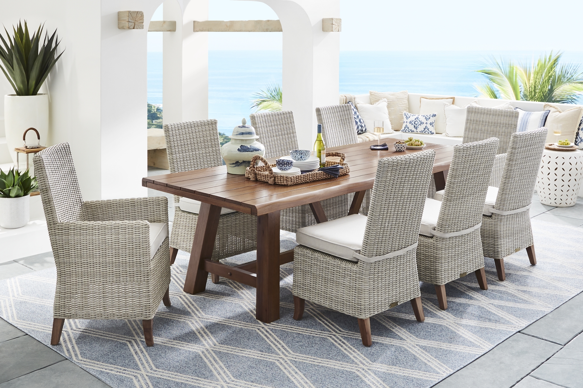 Patmos Tan 7 Pc 102 in. Rectangle Outdoor Dining Set With Linen Cushions full room