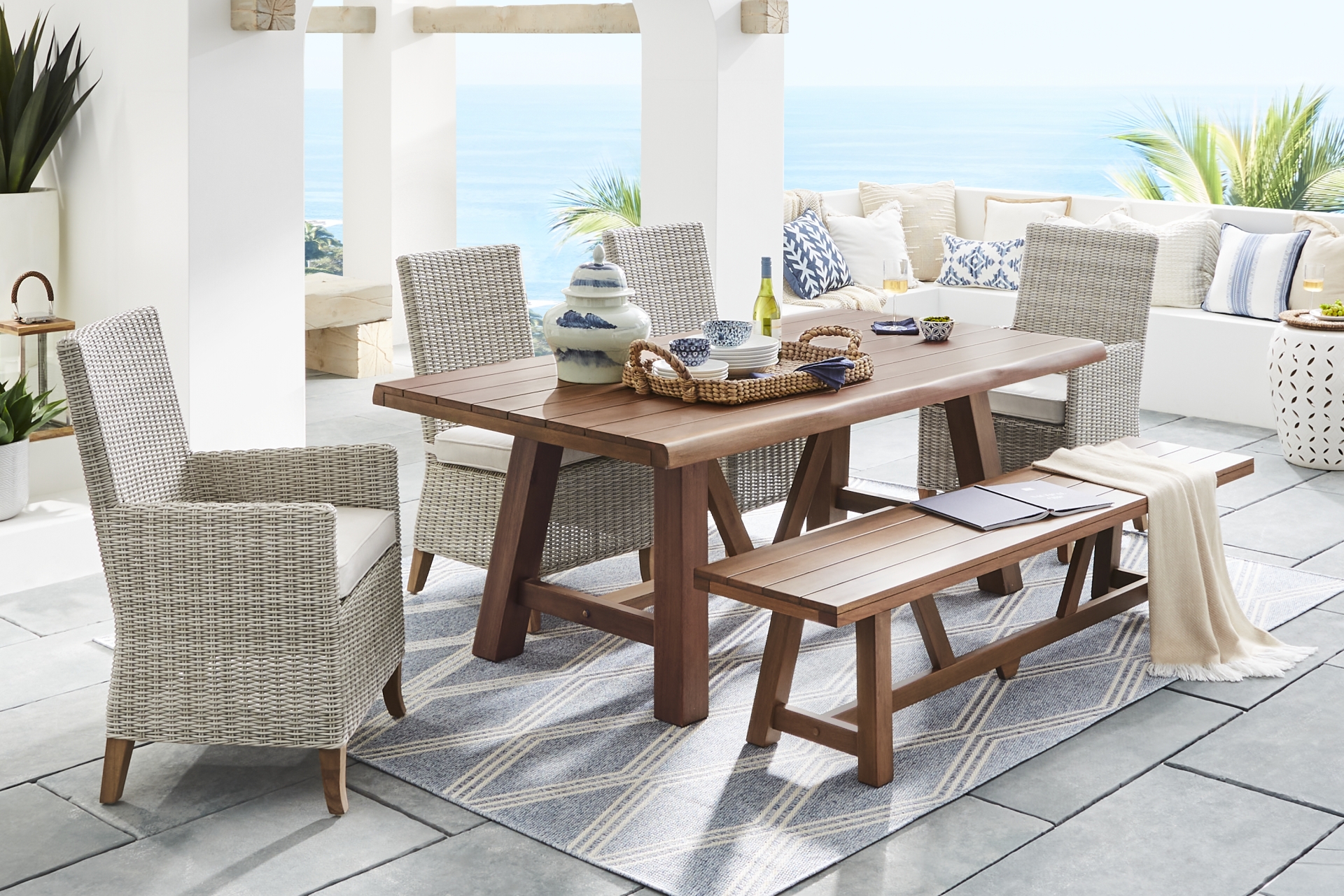 Patmos Tan 6 Pc 78 in. Rectangle Outdoor Dining Set With Linen Cushions full room