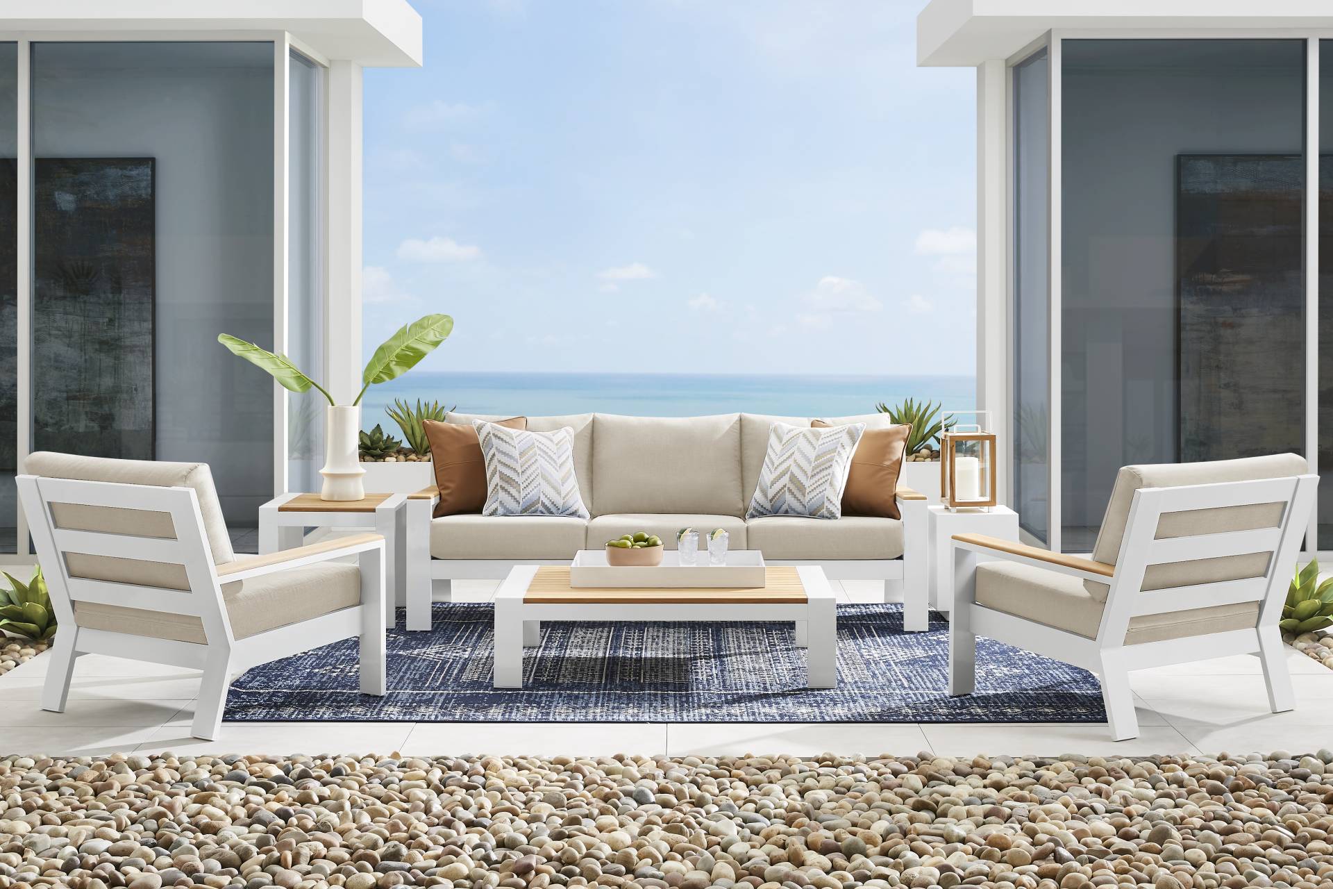 Solana White 4 Pc Outdoor Sofa Seating Set With Bisque Cushions full room