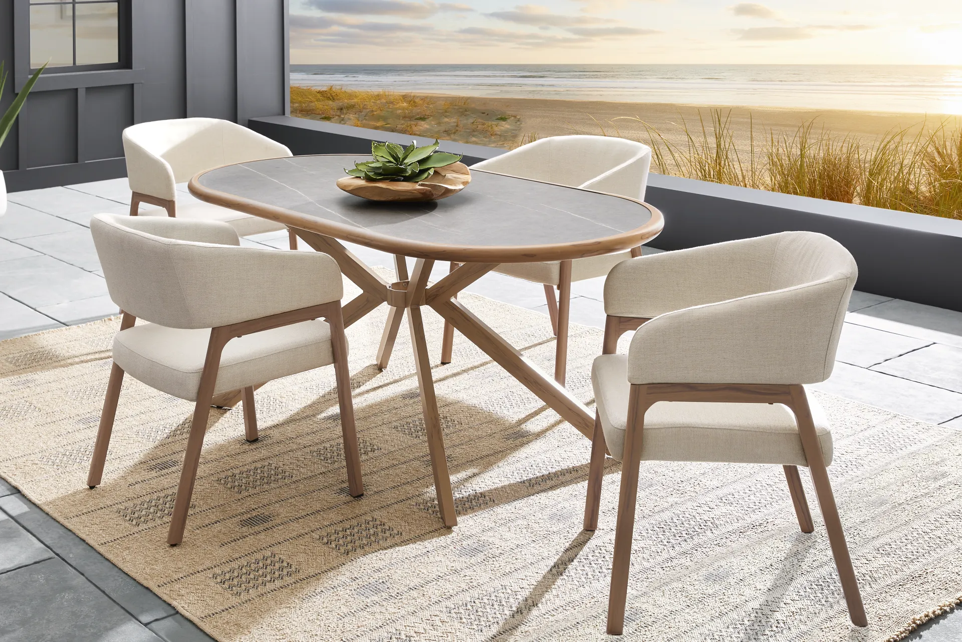 Logen Natural Oval Outdoor Dining Table - Image 1