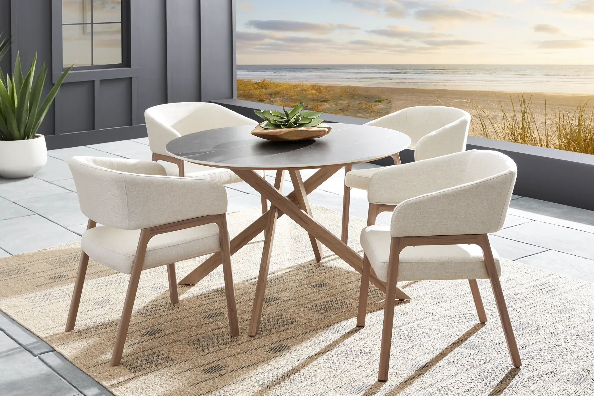 Logen Natural Round Outdoor Dining Table - Image 1