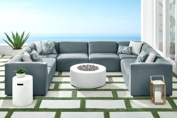 Calay 8 Pc Outdoor Sectional with Teal Slipcovers