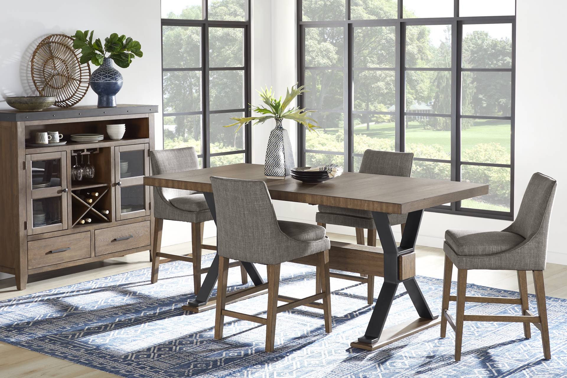 Hazelnut Woods 5 Pc Brown Counter Height Dining Room with Upholstered Stools full room