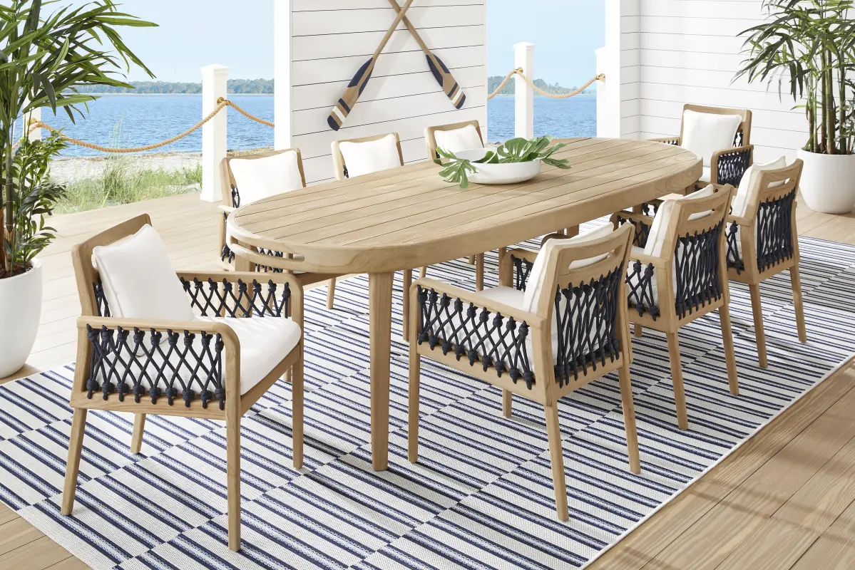 Riva Blonde 7 Pc Large Oval Outdoor Dining Set with White Cushions