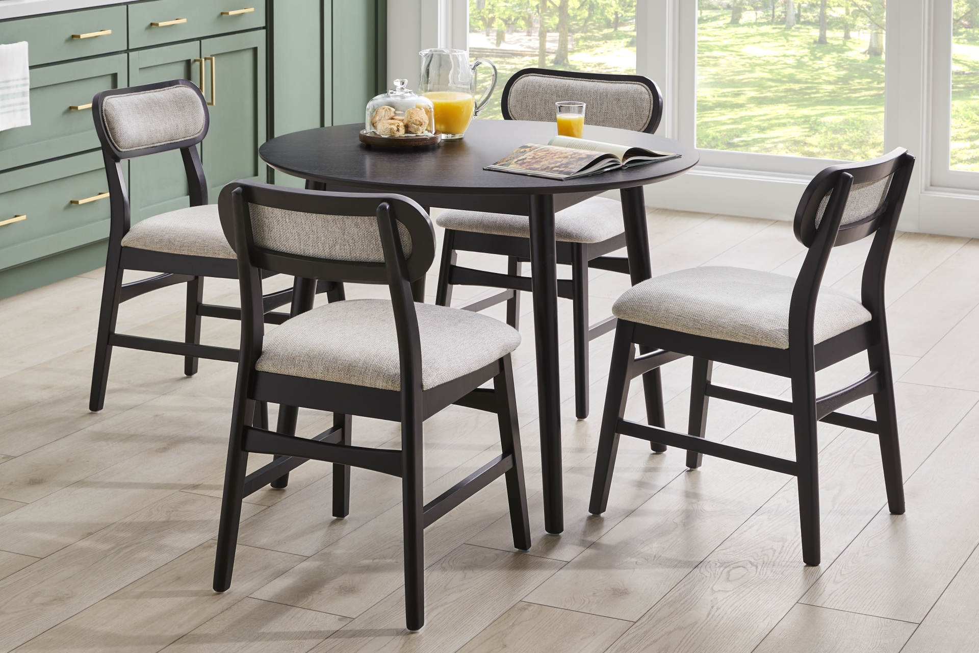 Watertown Black 5 Pc Round Dining Room with Upholstered Chairs full room
