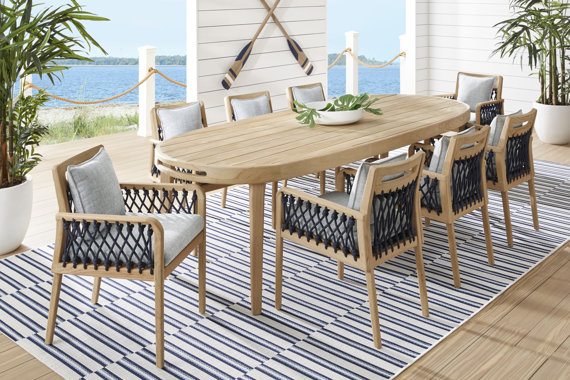 Riva Blonde 9 Pc Large Oval Outdoor Dining Set with Slate Cushions - Image 1