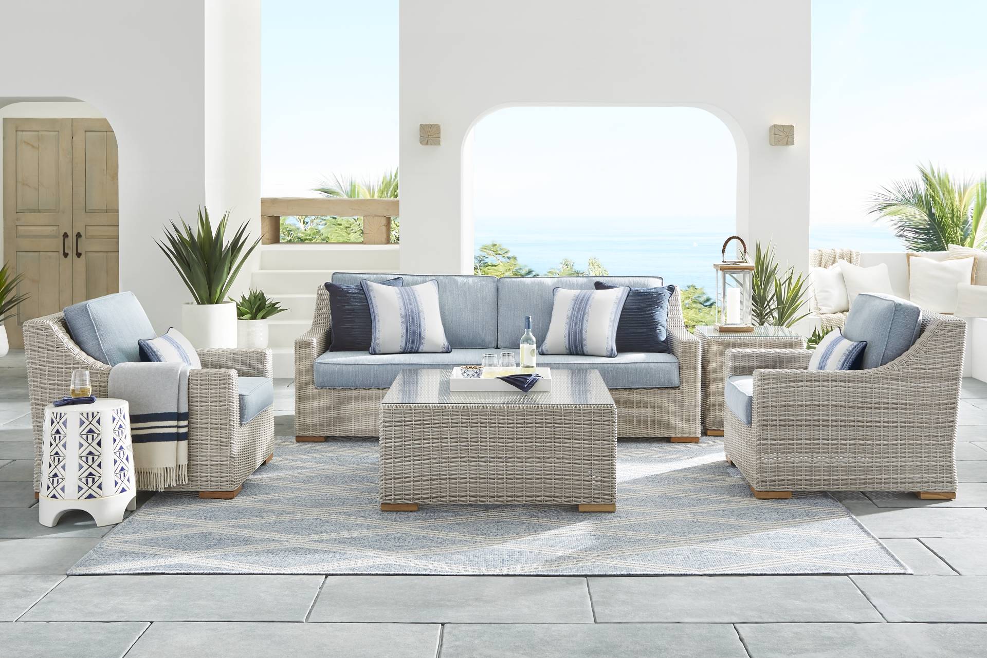Patmos Gray 4 Pc Outdoor Seating Set with Steel Cushions full room