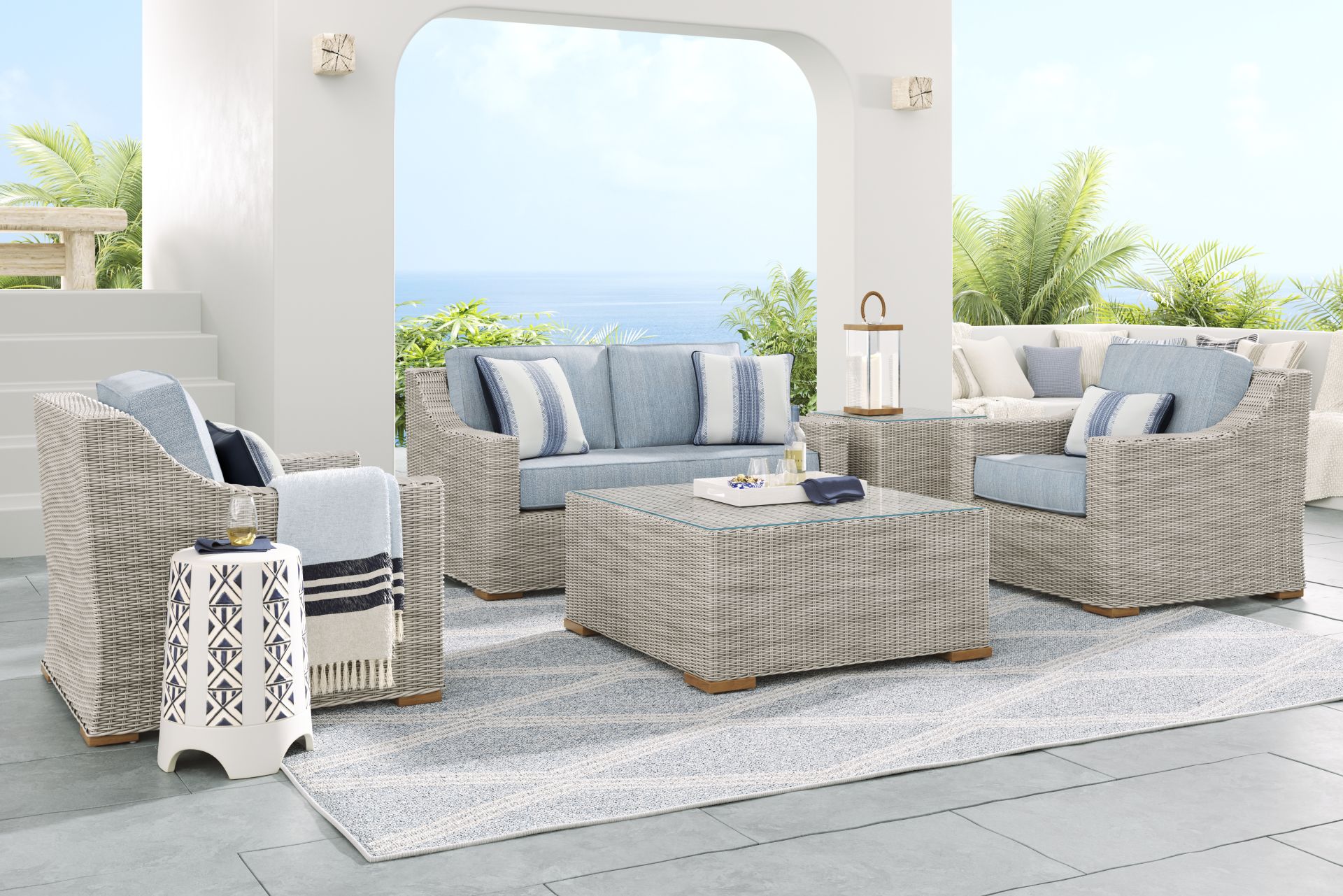 Patmos Gray 4 Pc Outdoor Loveseat Seating Set with Steel Cushions - Image 1