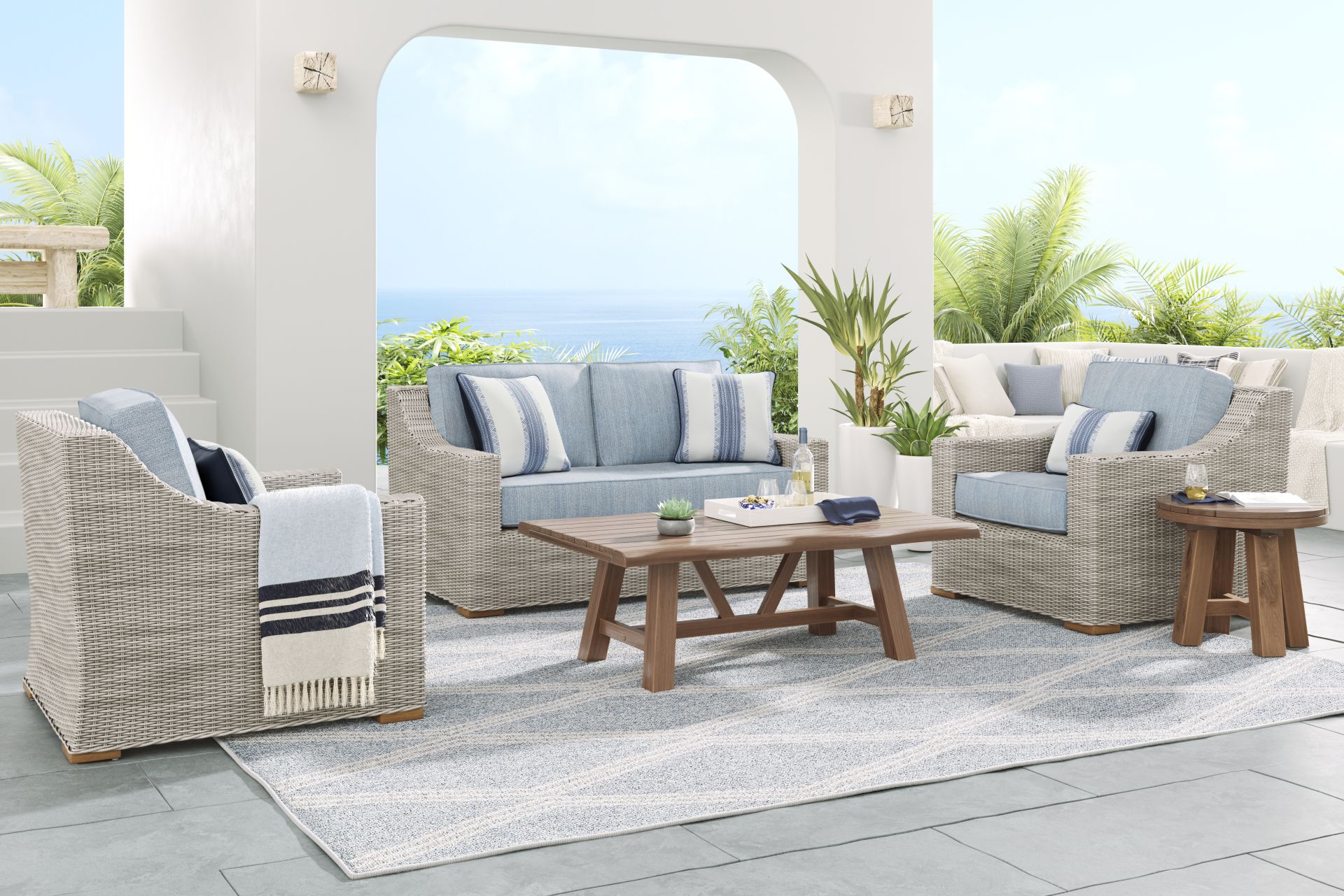 Patmos Gray 4 Pc Outdoor Loveseat Seating Set with Steel Cushions - Image 1