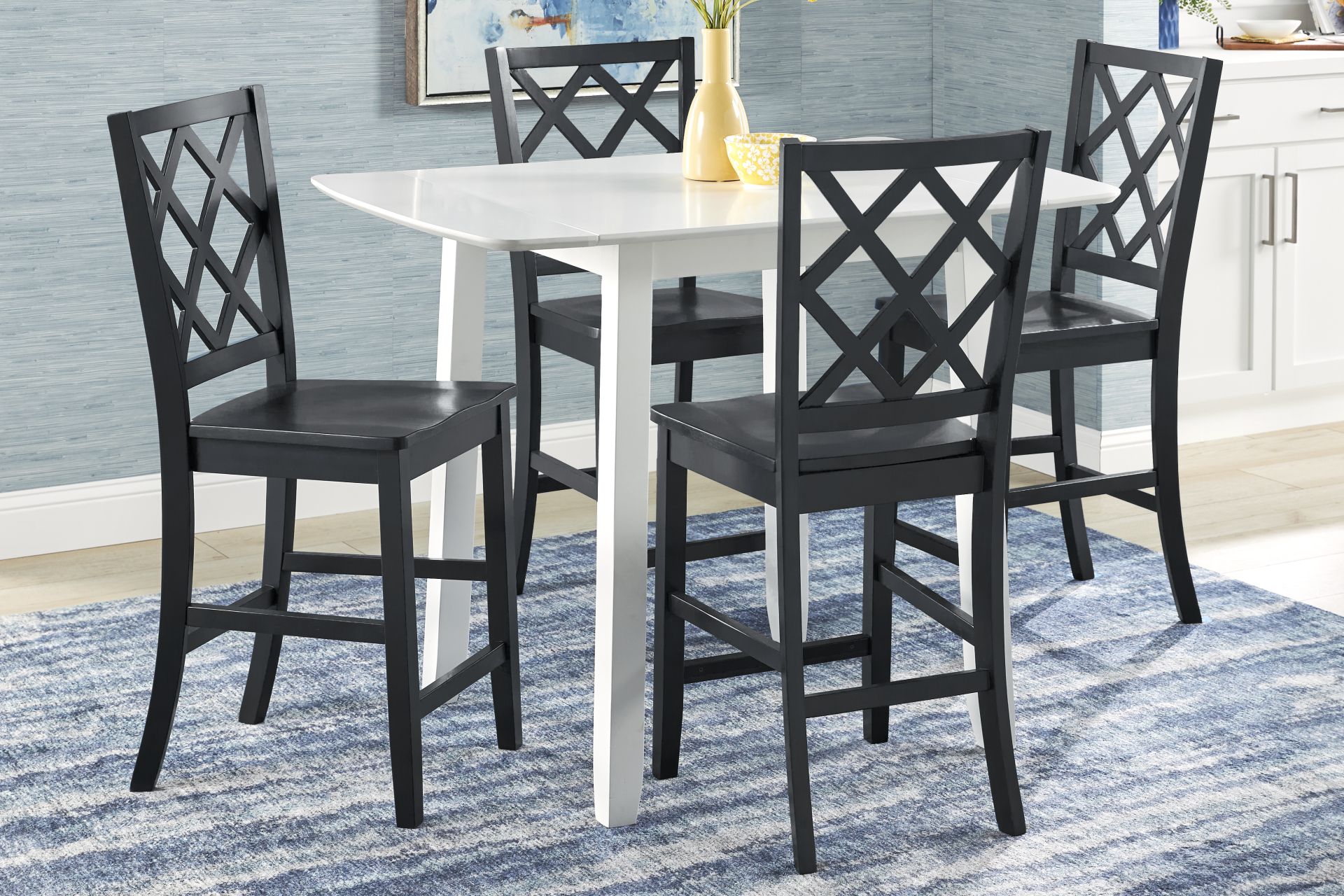 Concord White 5 Pc Counter Height Drop Leaf Dining Room with Black Diamond Back Stools - Image 1