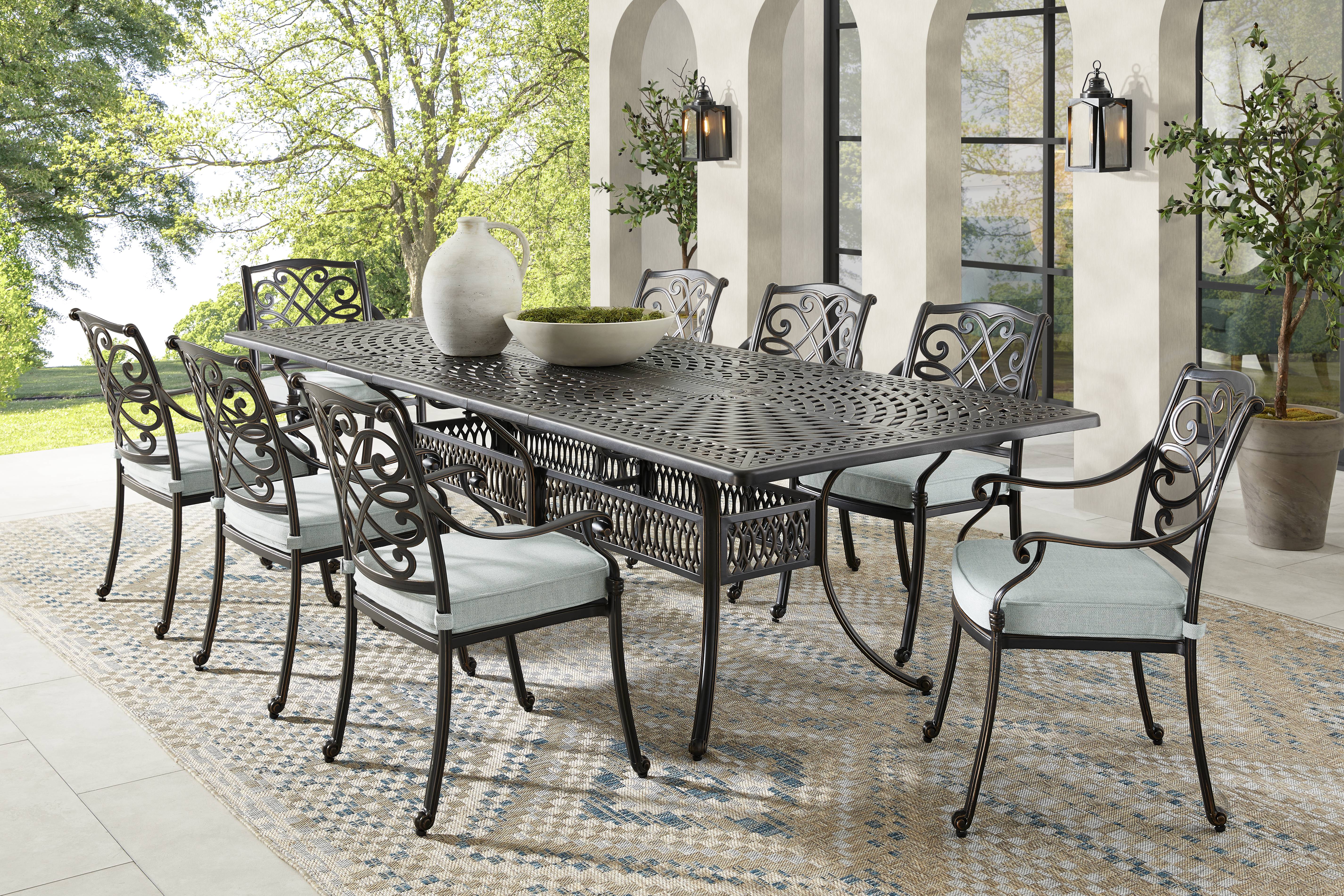 Carina Bronze 9 Pc 87-112 in. Rectangle Extension Outdoor Dining Set with Sky Cushions - Thumbnail - Image 1