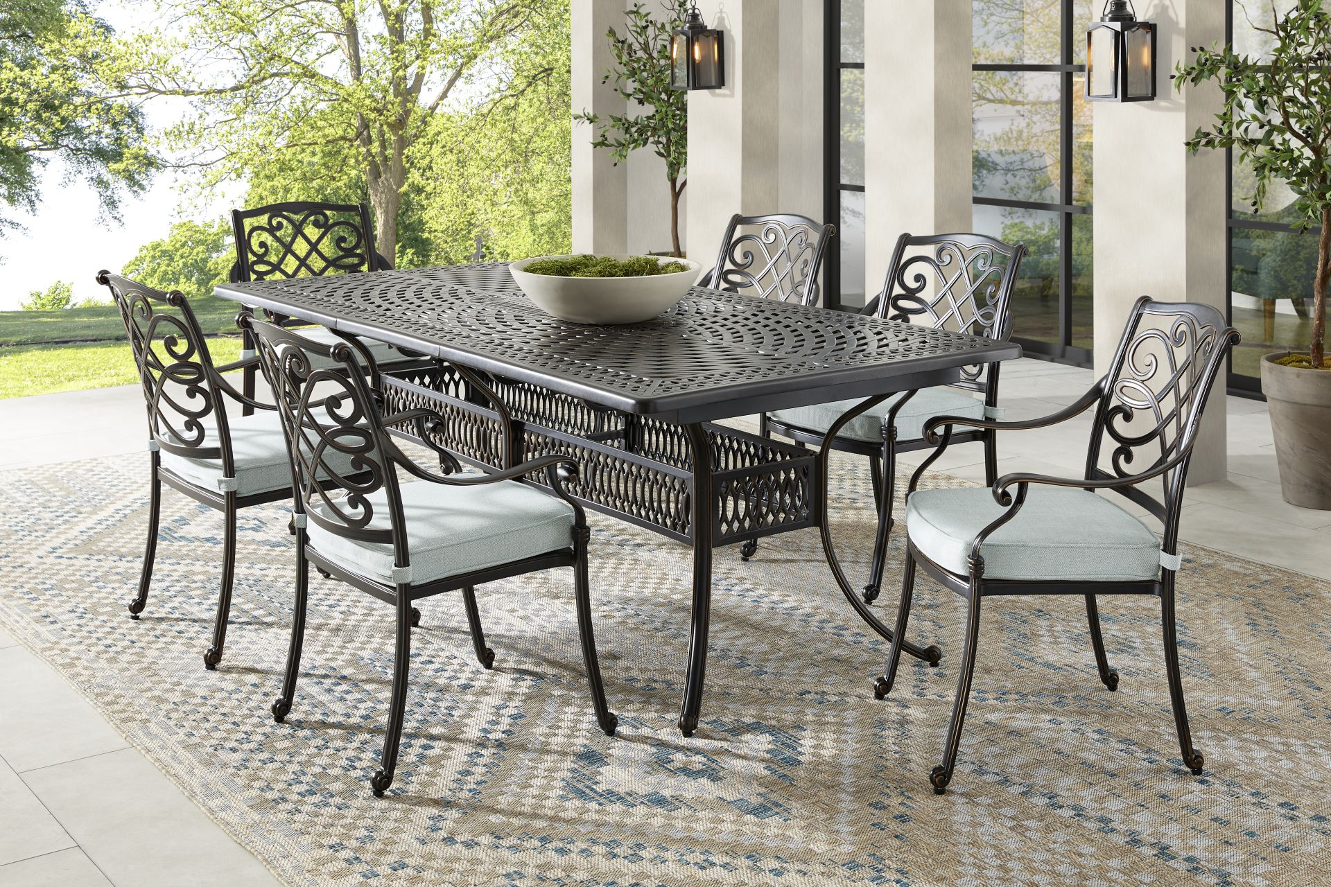 Carina Bronze 7 Pc 87-112 in. Rectangle Extension Outdoor Dining Set with Sky Cushions - Image 1