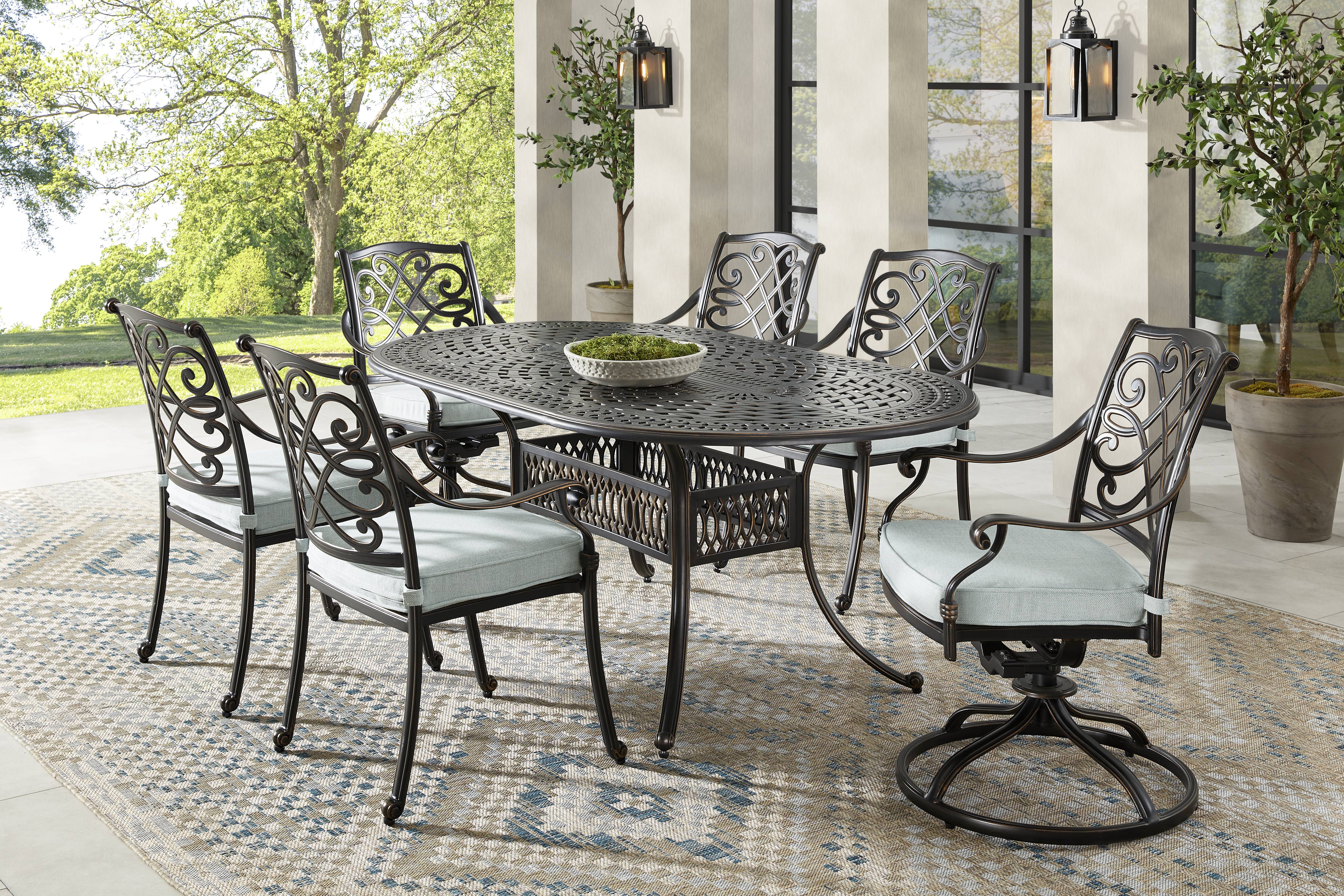 Carina Bronze 7 Pc Oval Outdoor Dining Set with Sky Cushions - Thumbnail - Image 1