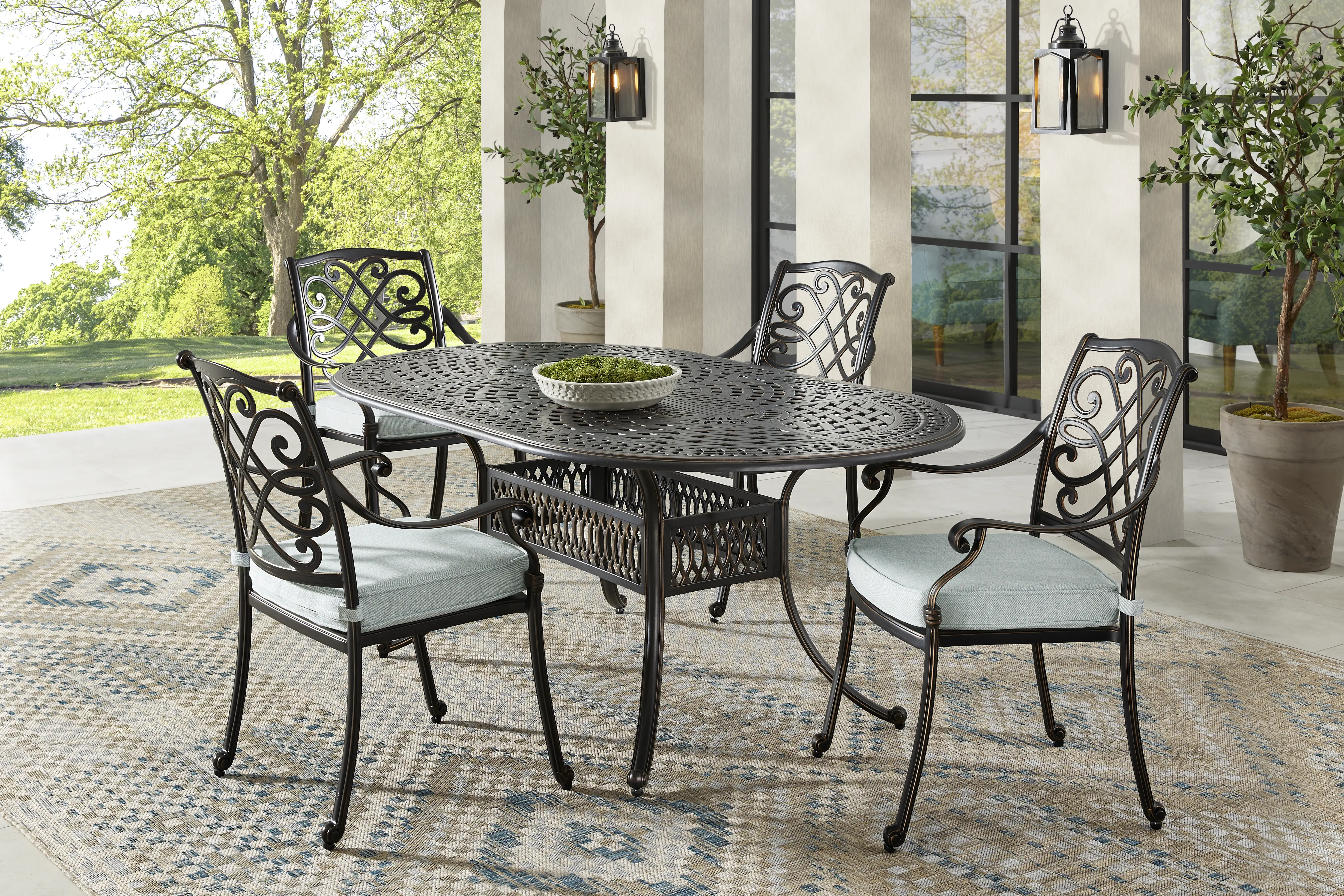 Carina Bronze 5 Pc Oval Outdoor Dining Set with Sky Cushions - Thumbnail - Image 1