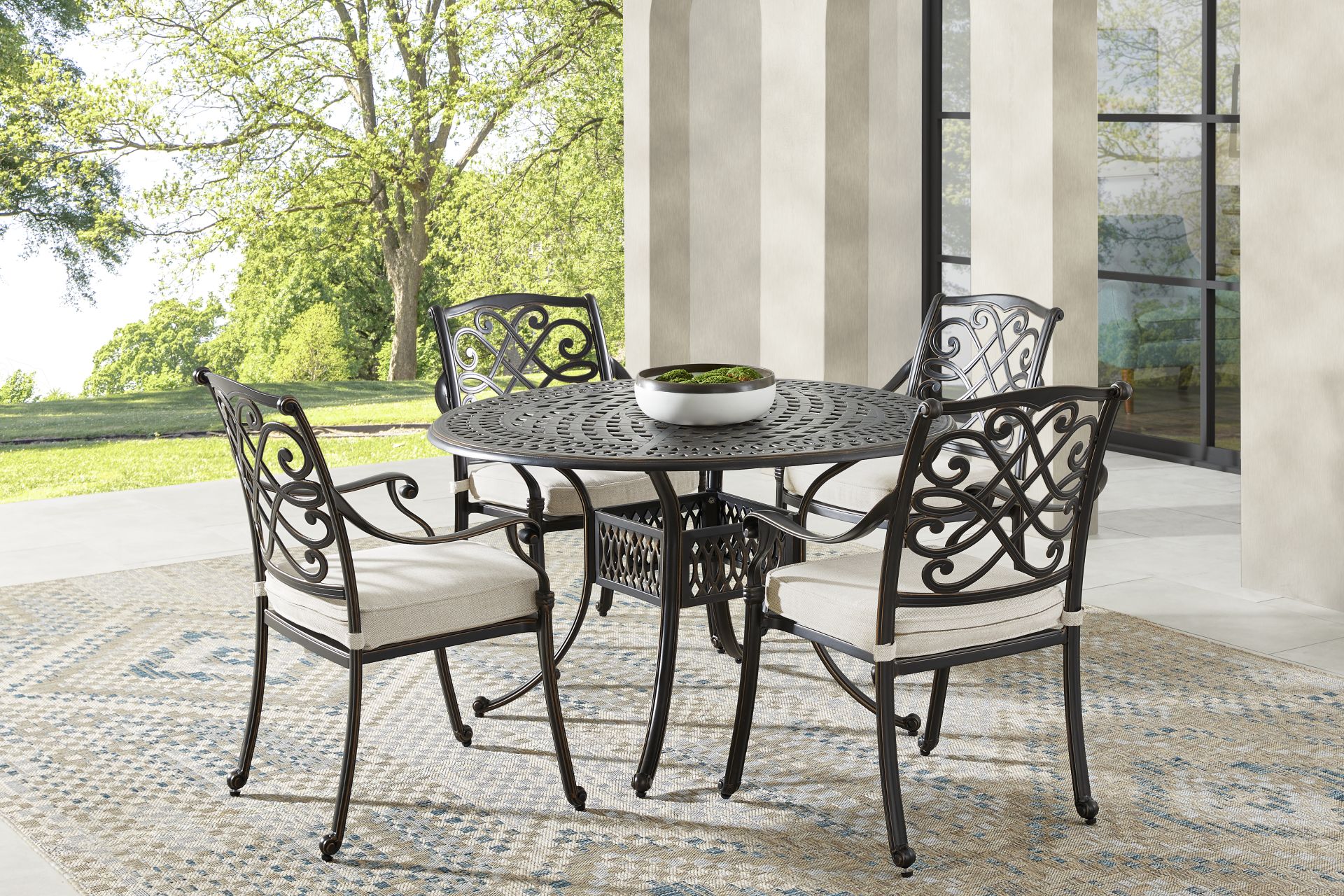 Carina Bronze 5 Pc 48 in. Round Outdoor Dining Set with Desert Cushions - Image 1
