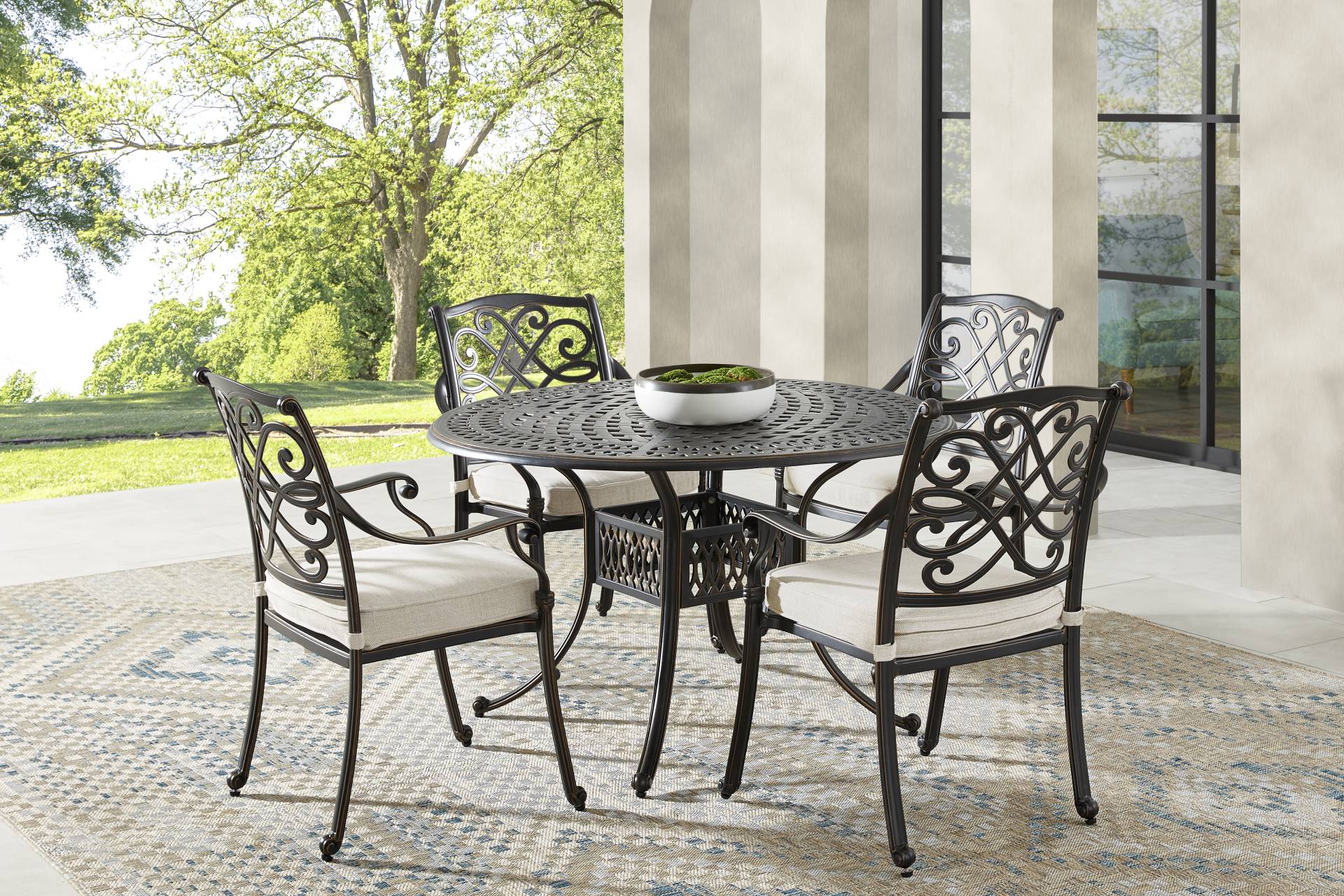 Carina Bronze 5 Pc 48 in. Round Outdoor Dining Set with Desert Cushions full room