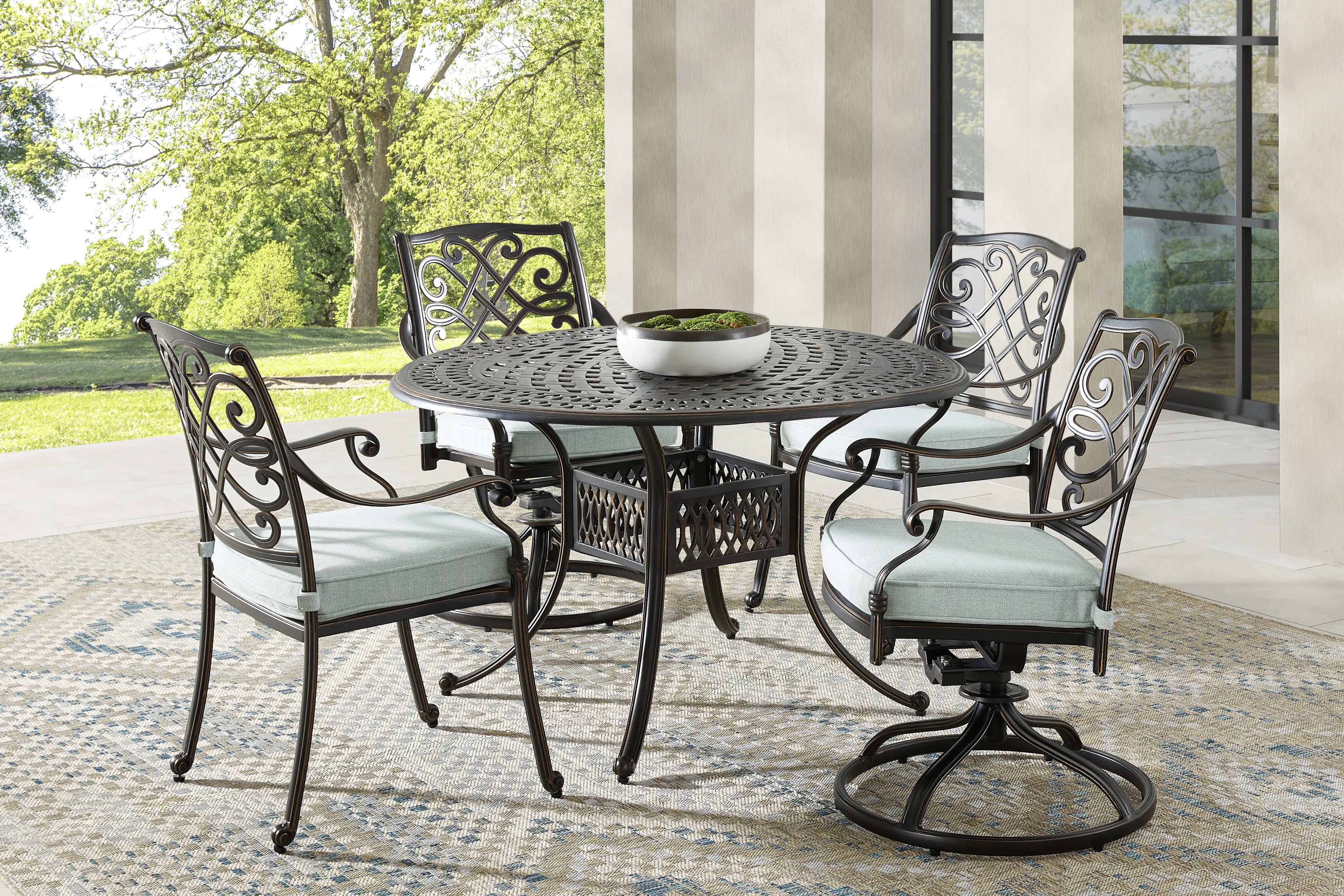 Carina Bronze 5 Pc 48 in. Round Outdoor Dining Set with Sky Cushions - Thumbnail - Image 1