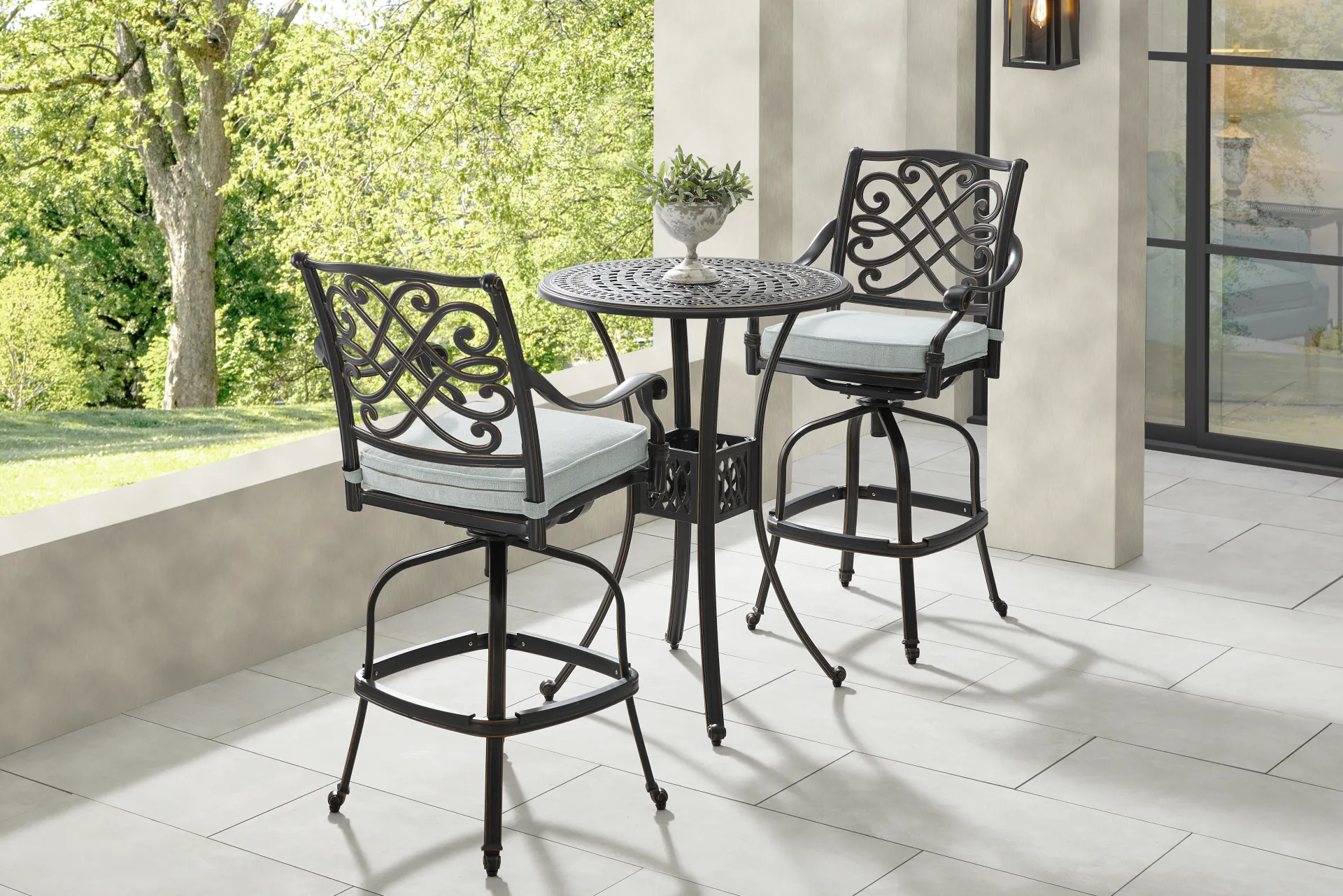 Carina Bronze Outdoor Swivel Barstool with Sky Cushion - Image 1