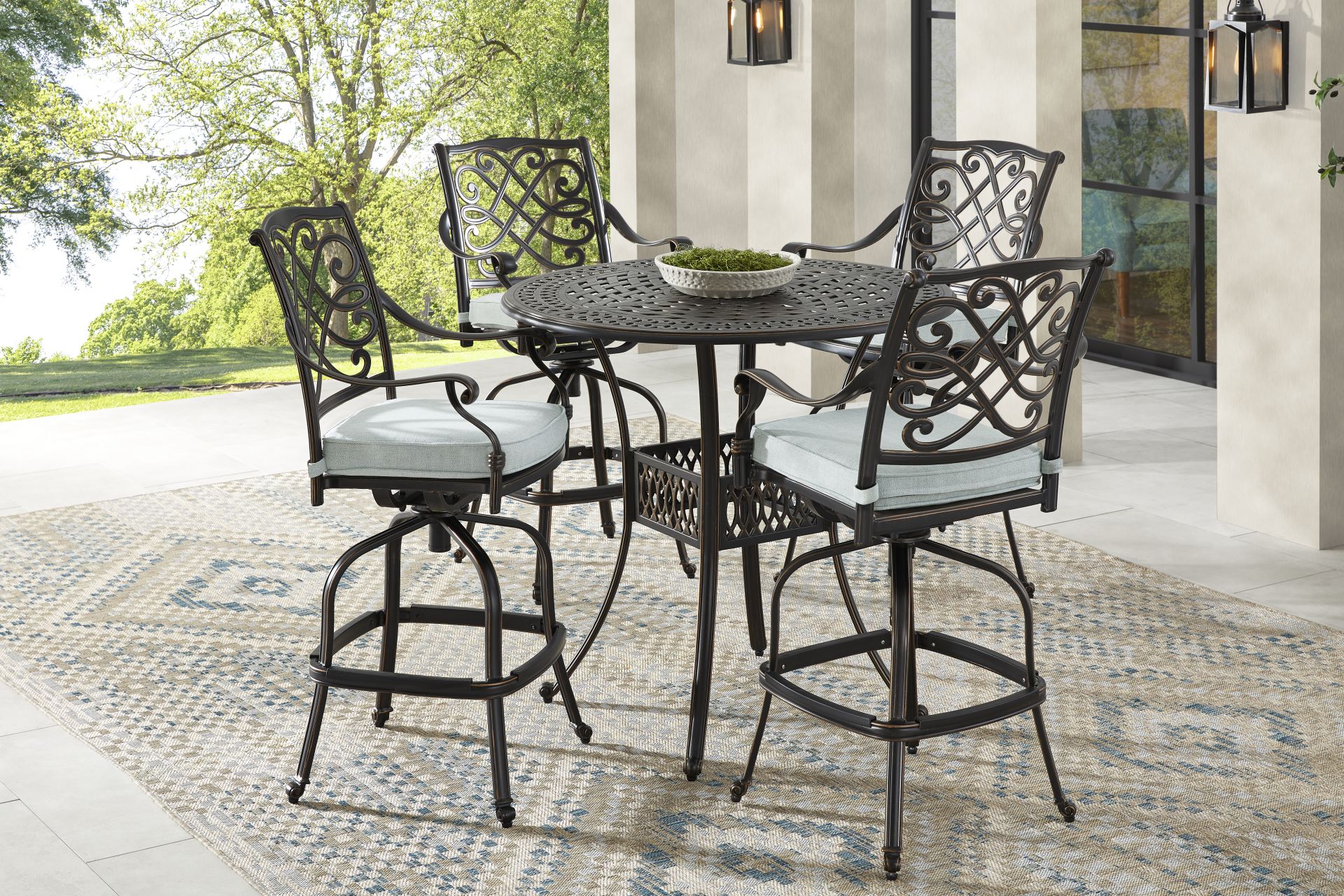 Carina Bronze 5 Pc 42 in. Round Bar Height Outdoor Dining Set with Sky Cushions - Image 1