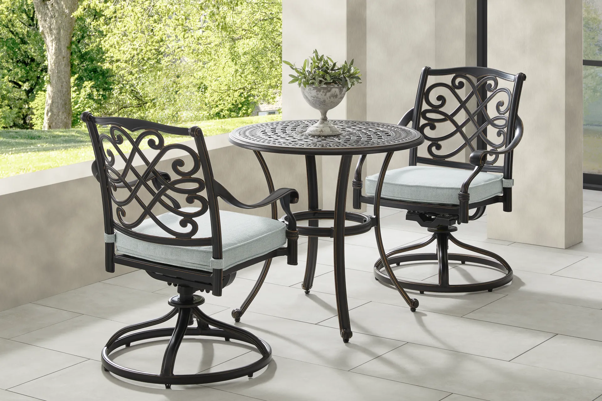 Carina Bronze Outdoor Swivel Rocker Chair with Sky Cushion - Image 2