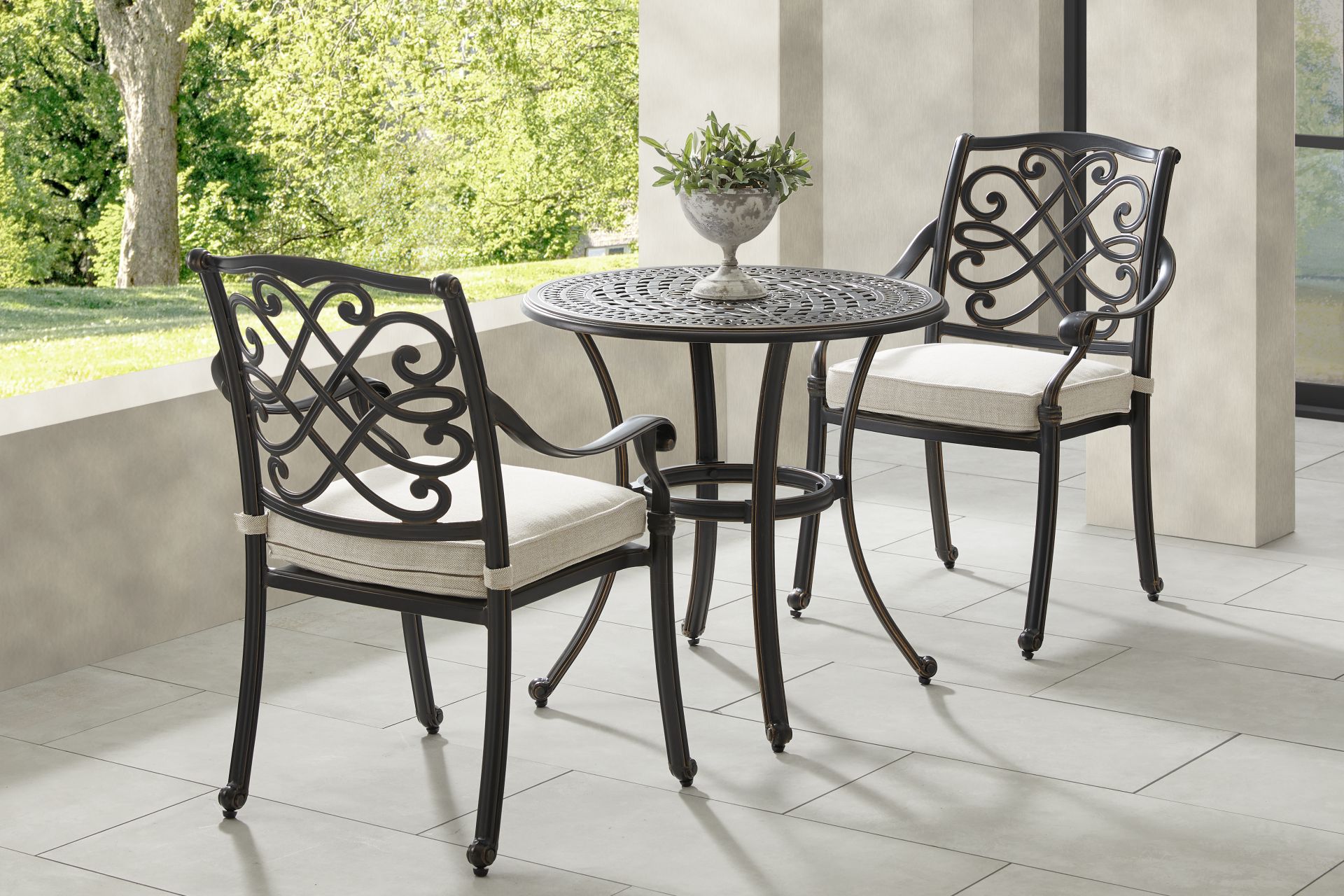 Carina Bronze 3 Pc 30 in. Round Outdoor Dining Set with Desert Cushions - Image 1