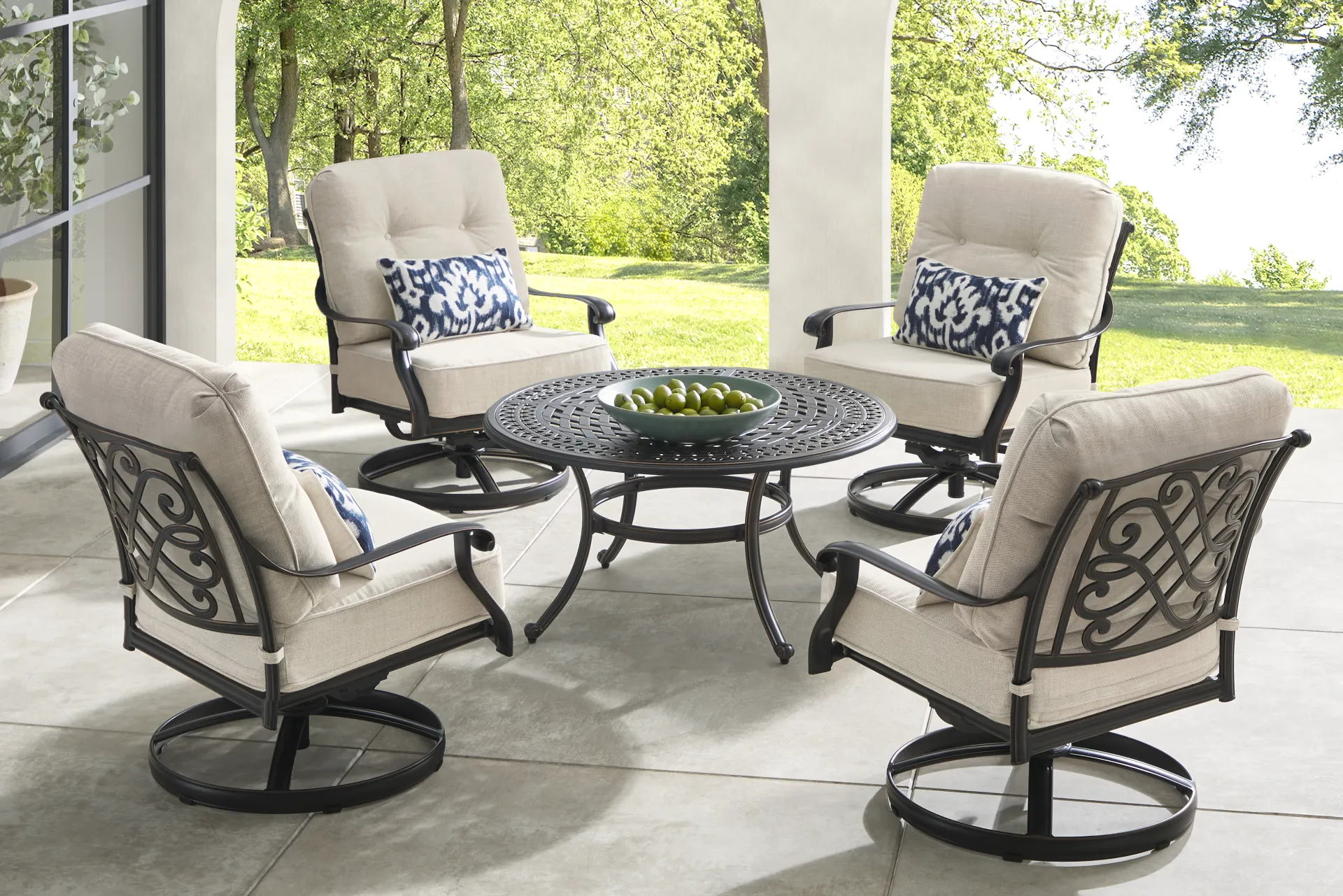 Carina Bronze Round Outdoor Cocktail Table - Image 1