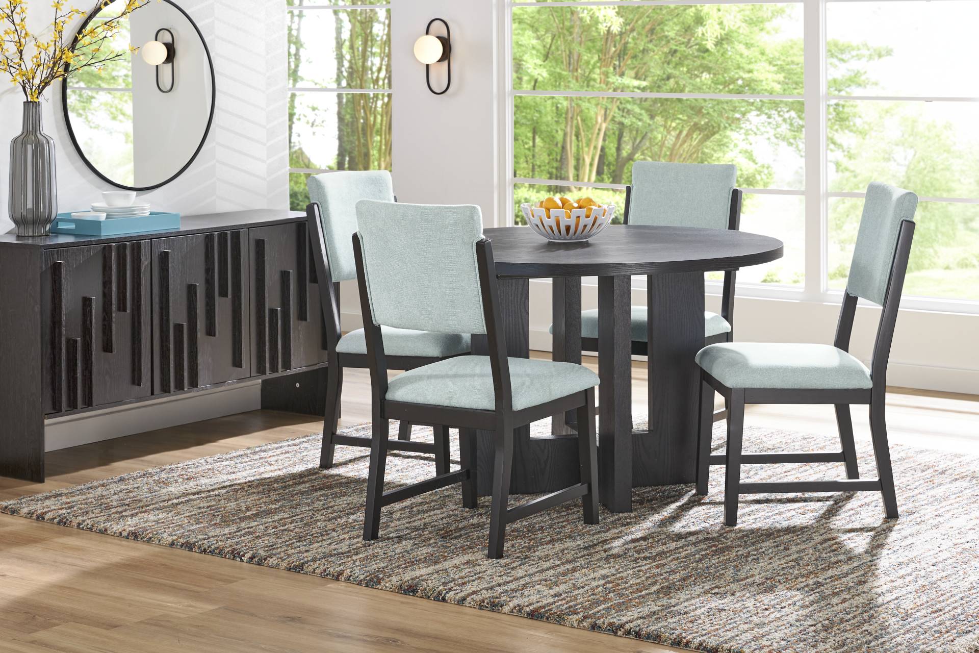 Rosolli Black 5 Pc Round Dining Room with Blue Upholstered Chairs full room