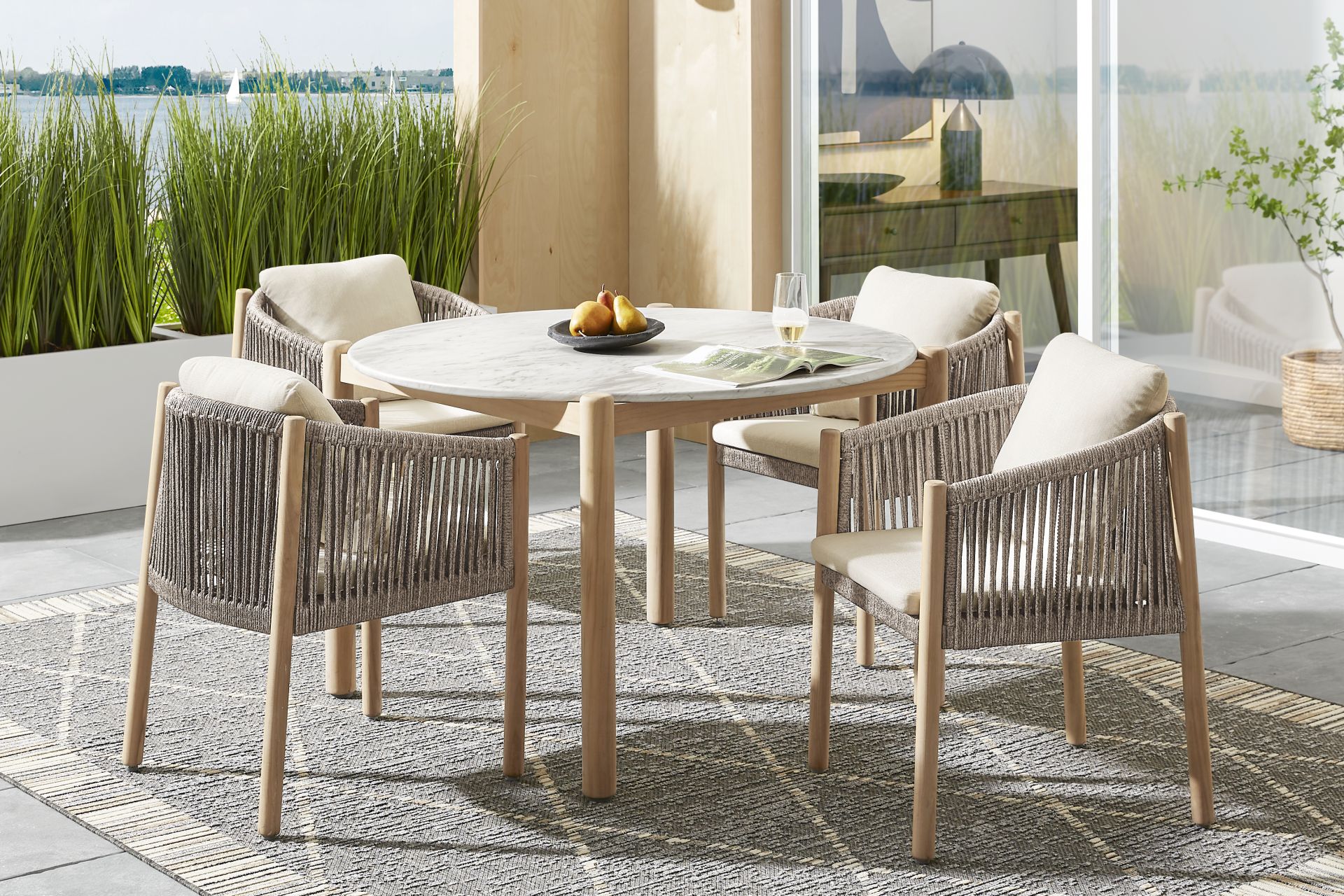 Koda Natural 5 Pc Round Outdoor Dining Set with Beige Arm Chairs - Image 1