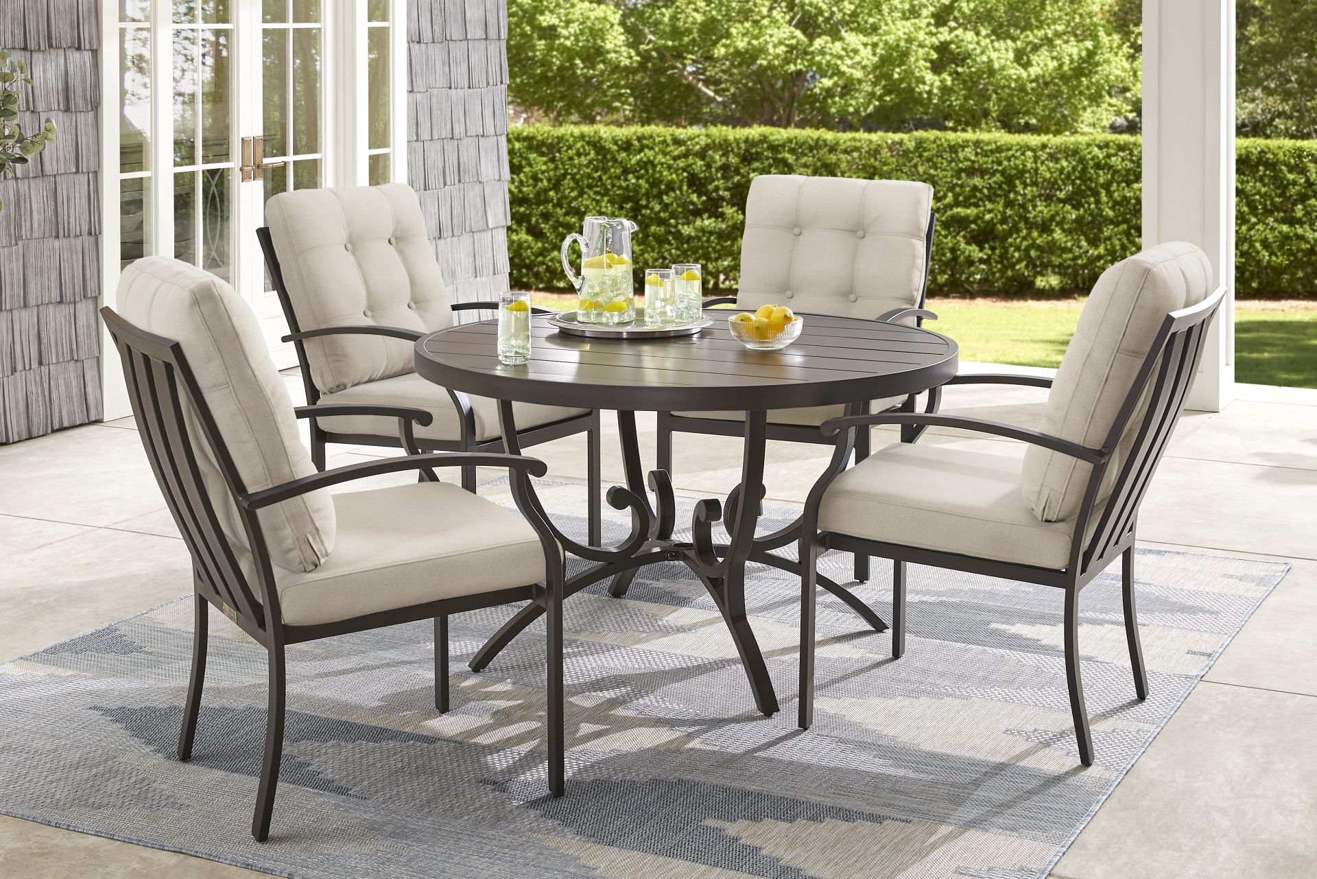 Lake Breeze Aged Bronze 5 Pc Round Outdoor Dining Set with Desert Cushions - Image 1