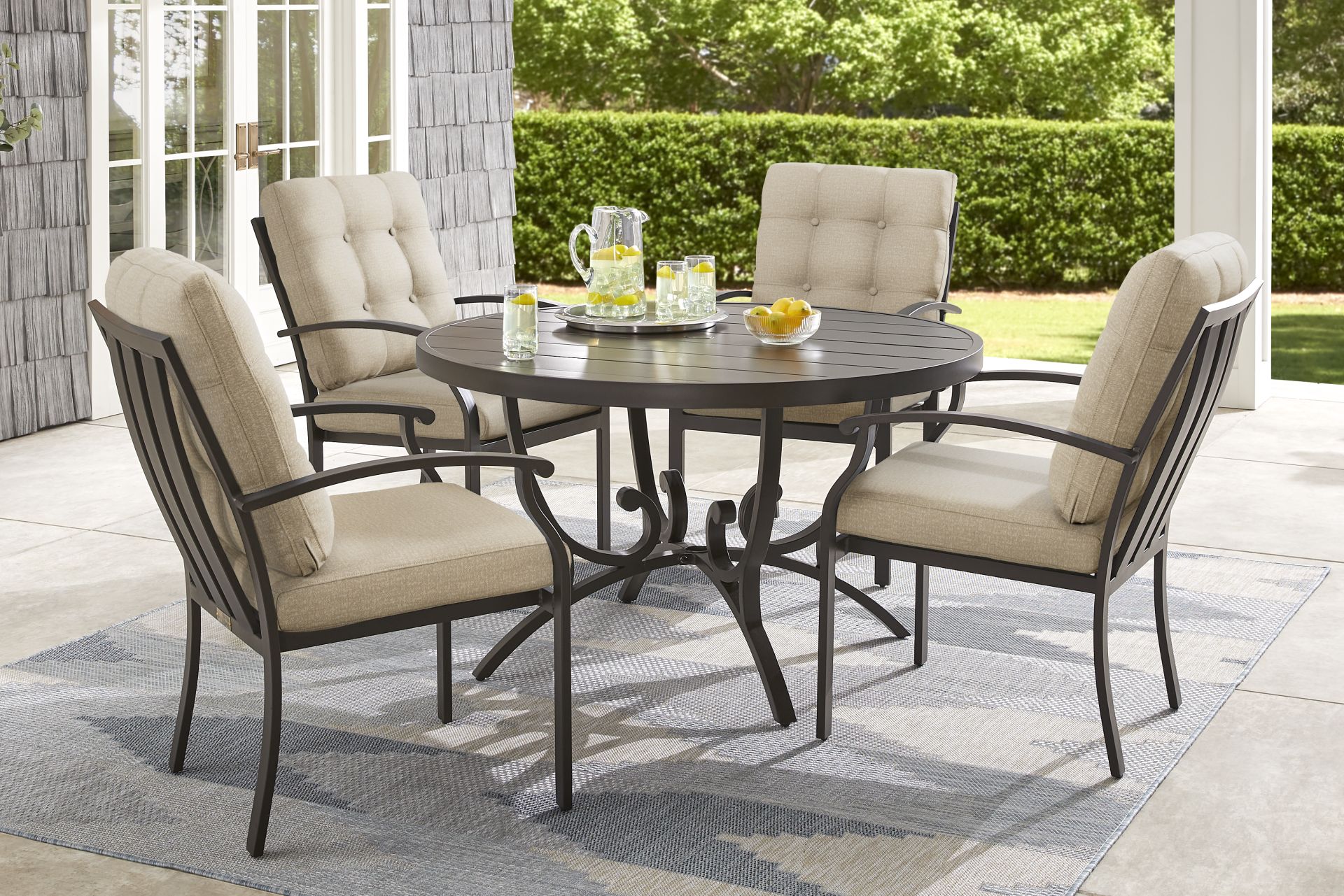 Lake Breeze Aged Bronze 5 Pc Round Outdoor Dining Set with Hemp-Colored Cushions - Image 1