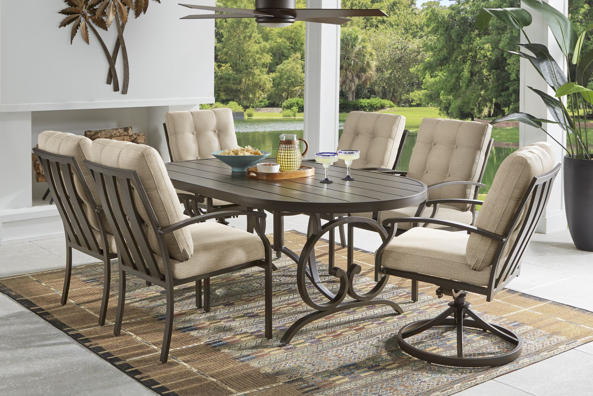 Lake Breeze Aged Bronze 7 Pc Oval Outdoor Dining Set with Hemp-Colored Cushions - Image 1