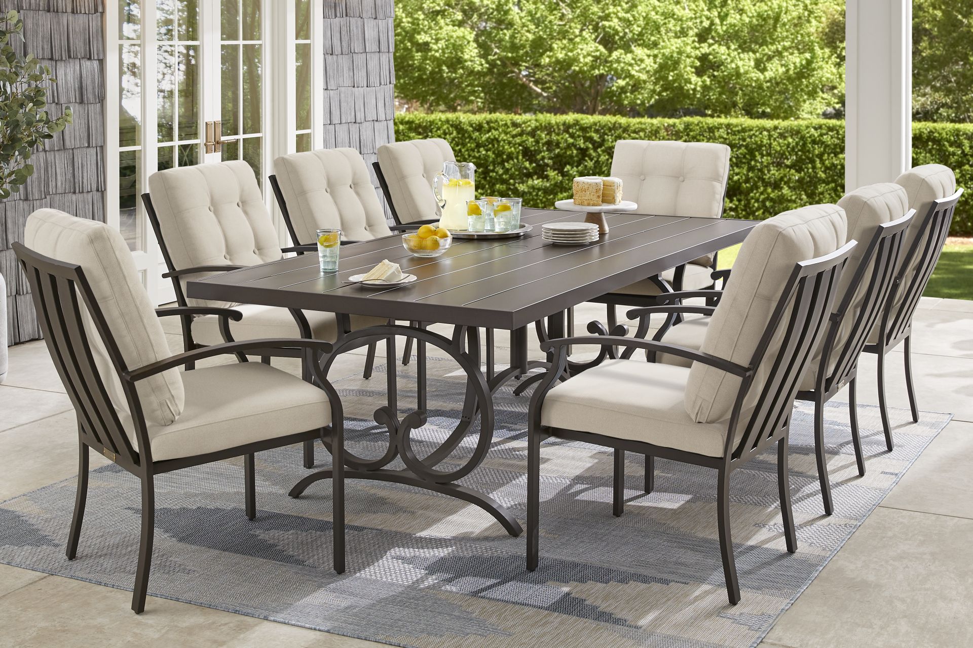Lake Breeze Aged Bronze 9 Pc Outdoor Dining Set with Desert Cushions - Image 1