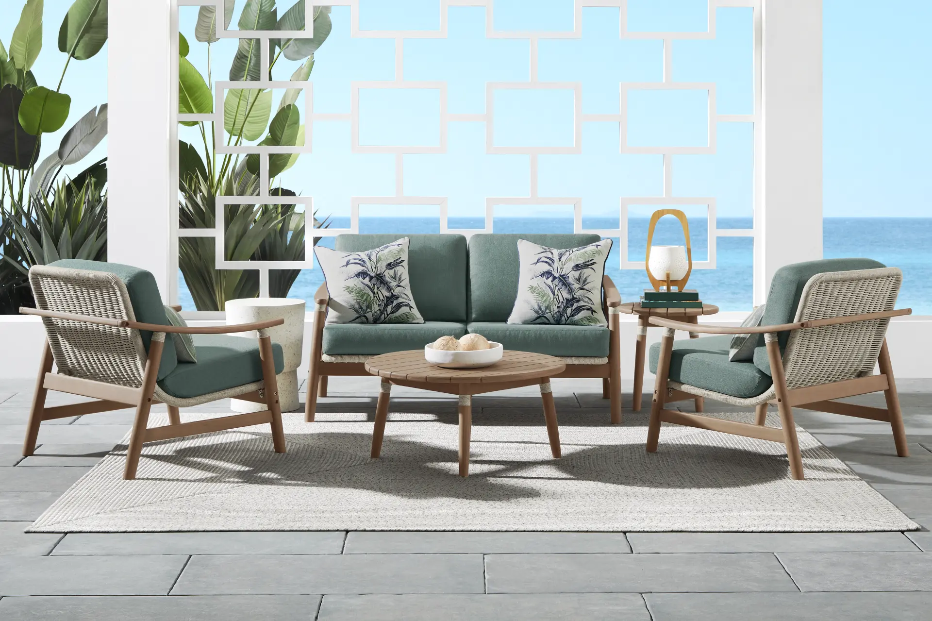 Raphina Gray 4 Pc Outdoor Loveseat Seating Set with Jungle Cushions