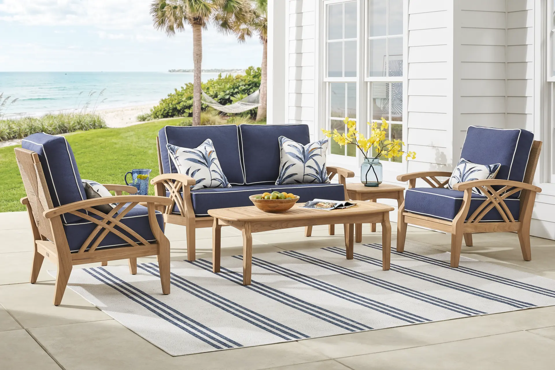 Pleasant Bay Woven Teak 4 Pc Outdoor Loveseat Seating Set with Indigo Cushions
