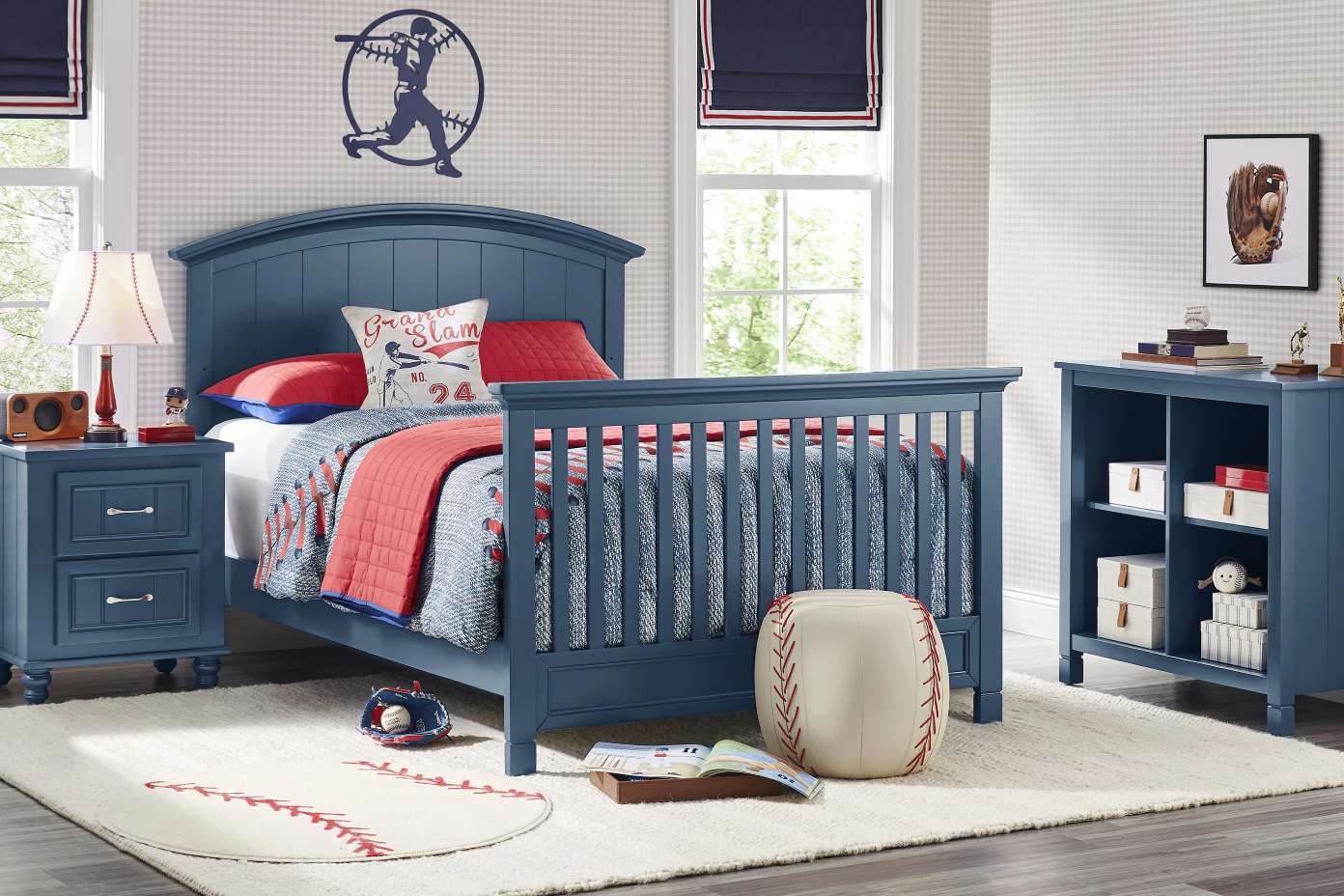 A blue baseball-themed bedroom set with a bed, nightstand, and bookshelf.
